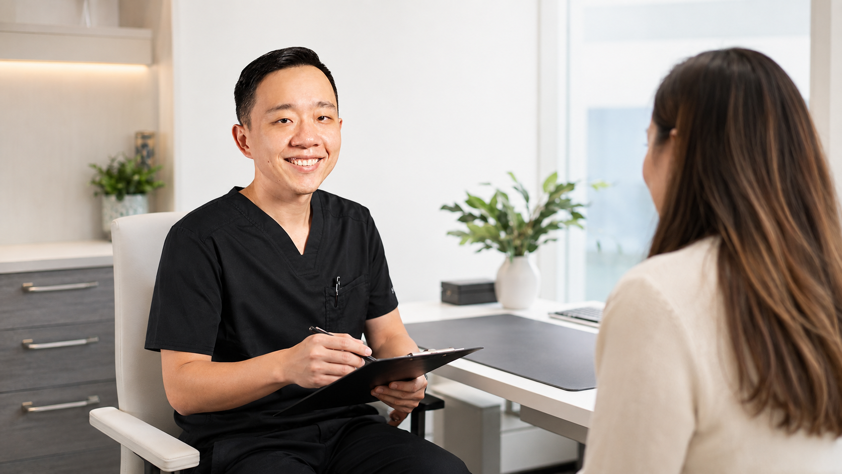 Concierge physician explaining what is included and not included in a concierge medicine membership to a patient