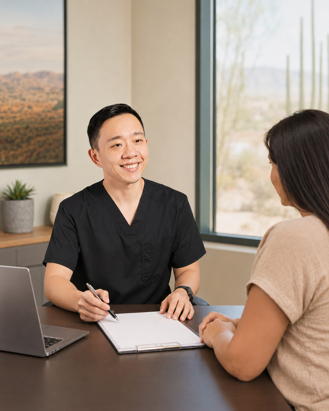 Dr. Hu reviewing a medical documentation request with an Arizona patient