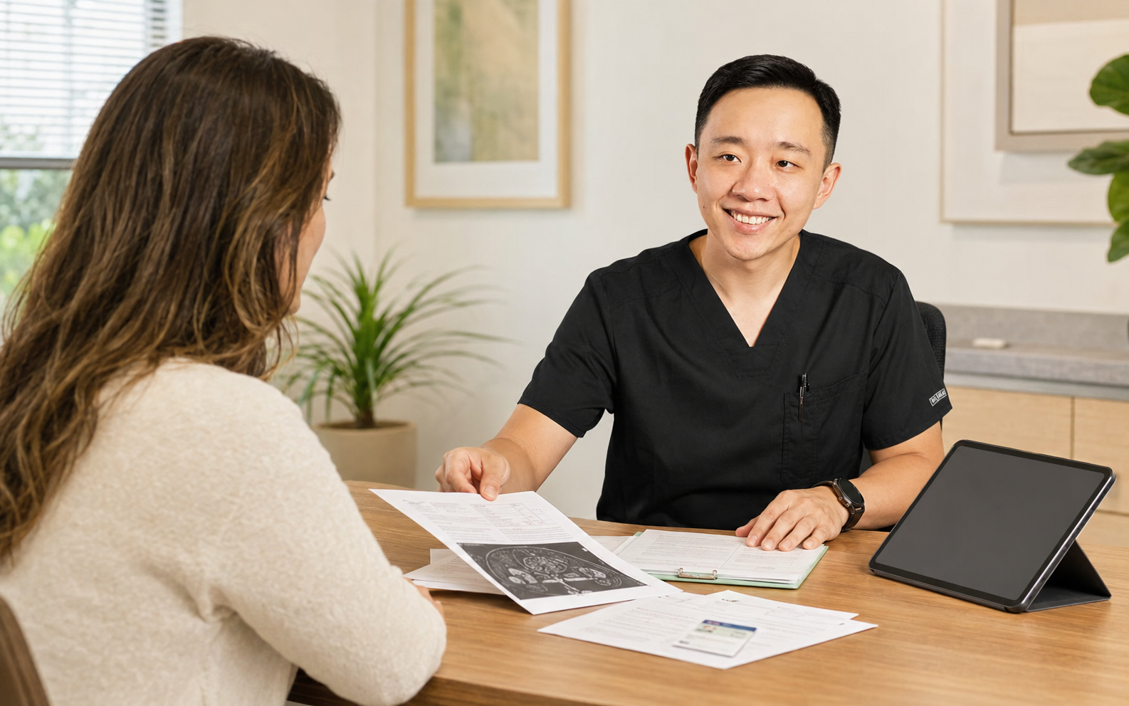 Physician reviewing medical records for an Arizona medical marijuana certification evaluation