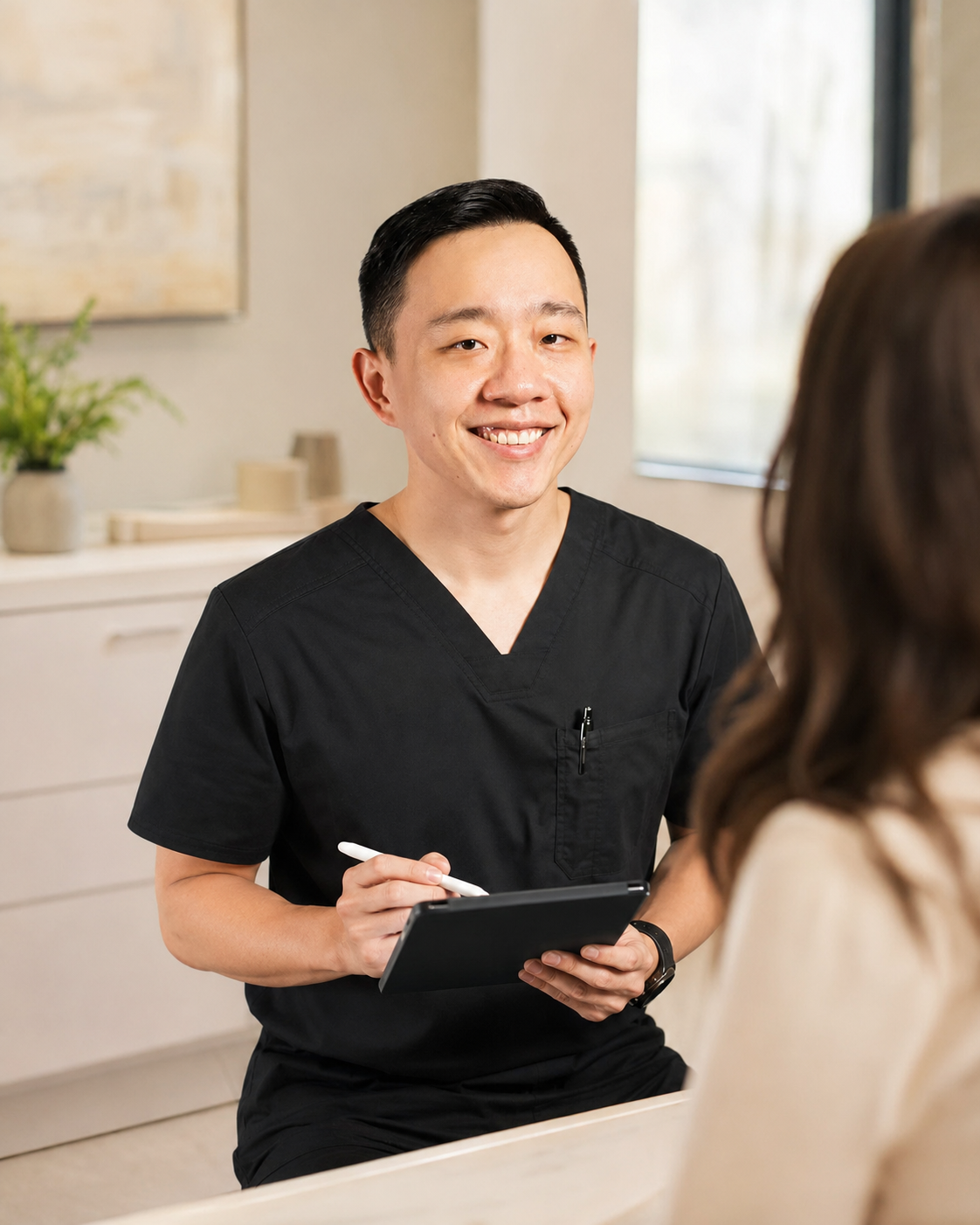 Dr. Hu providing personalized medical weight loss care for a patient in Arizona