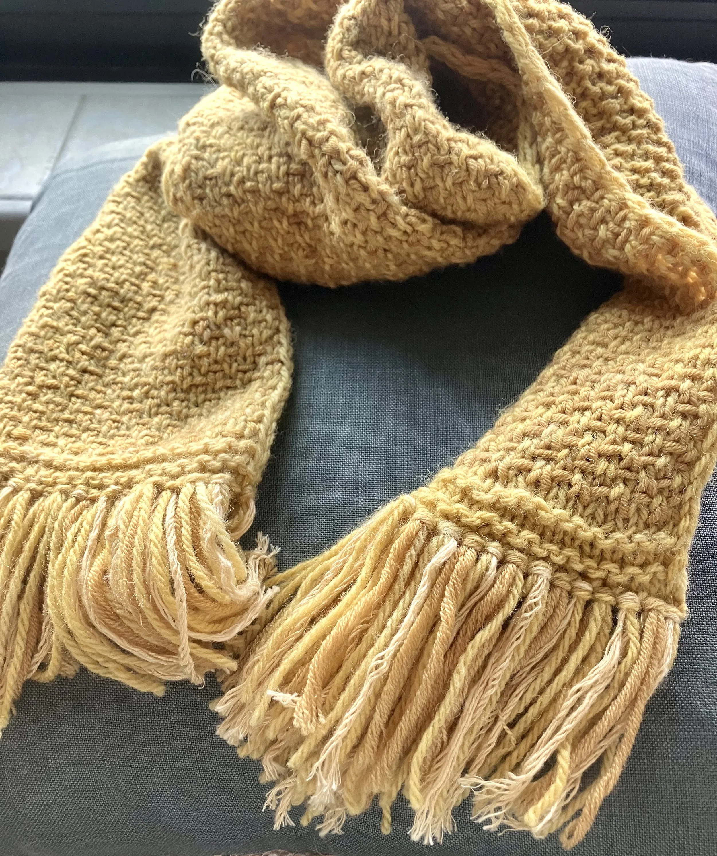 Scarf made from yarns dyed with marigold, tansy, and jewelweed