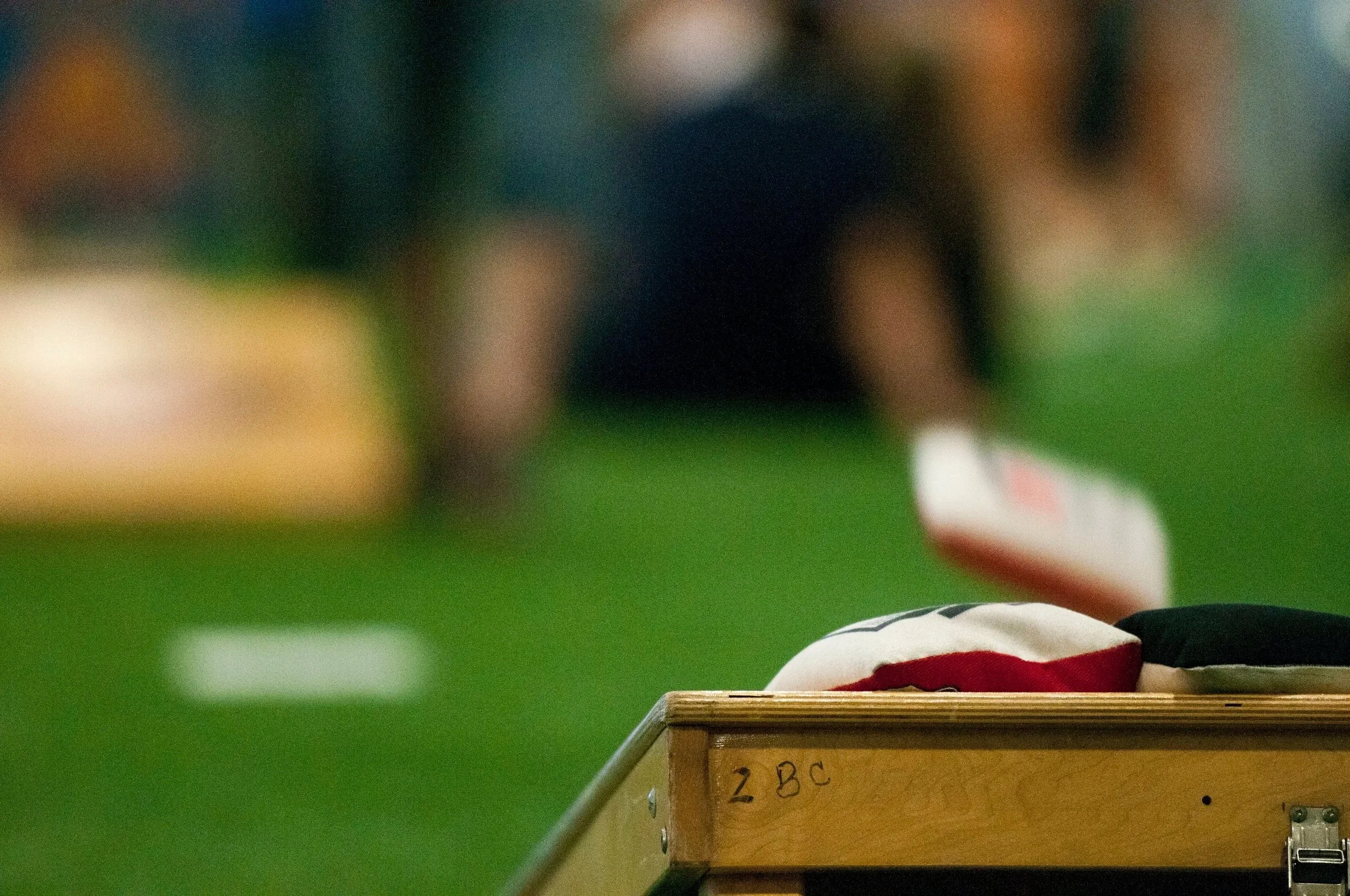 A cornhole bag drops to the board at the American Cornhole Organization Majors, Season X, in Virginia Beach, Virginia, April 18, 2015. Cornhole is a game similar to horseshoes.