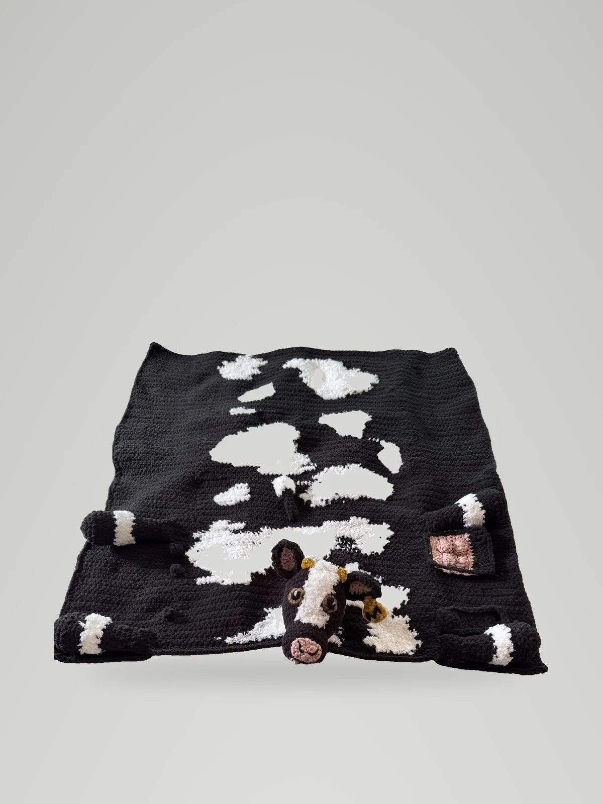 Cuddle-and-play cow blanket, made to size for newborn