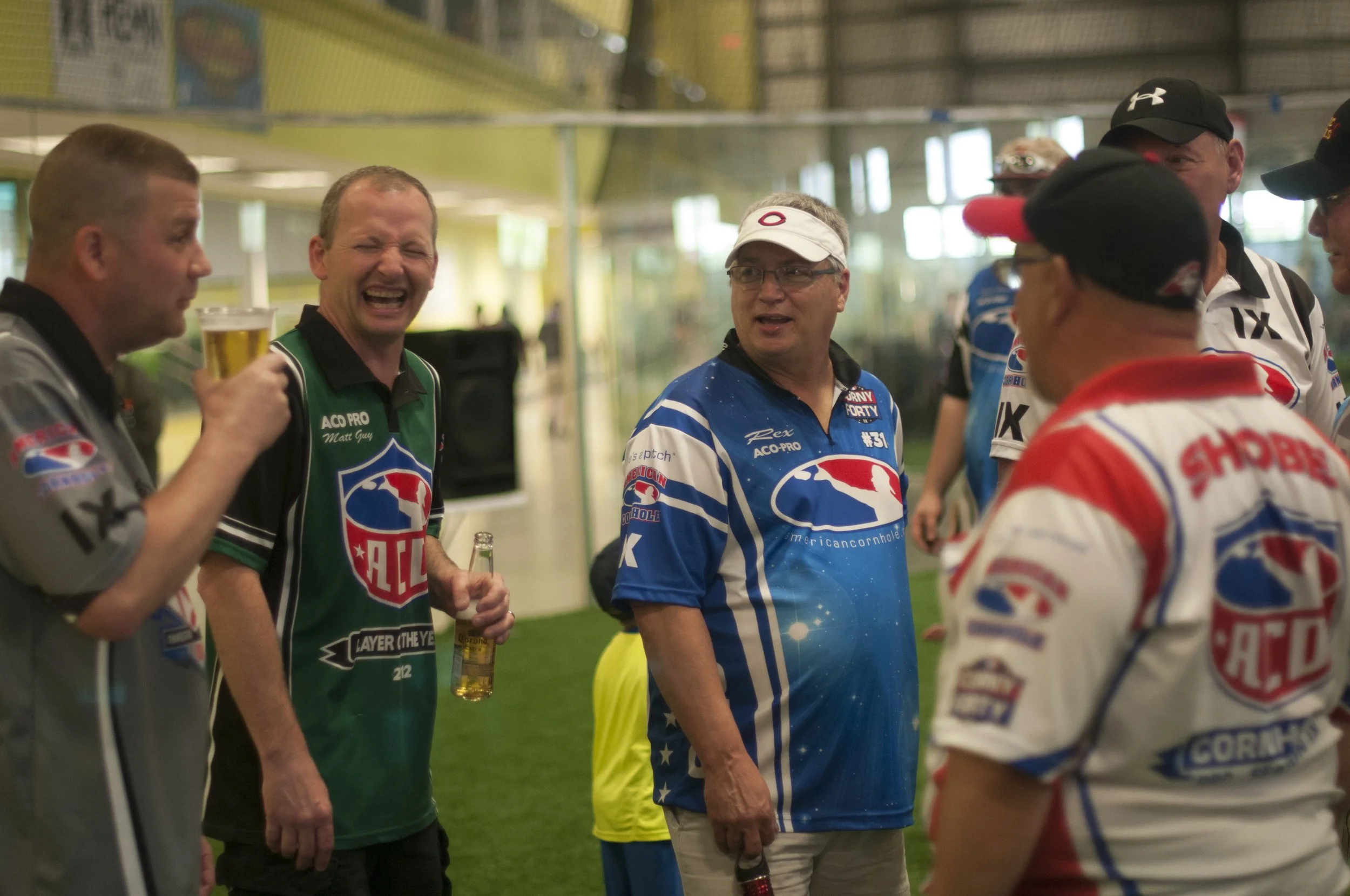 Participants share drinks and jokes at the ACO Majors, Season X, Virginia Beach, Virginia, April 18, 2015.
