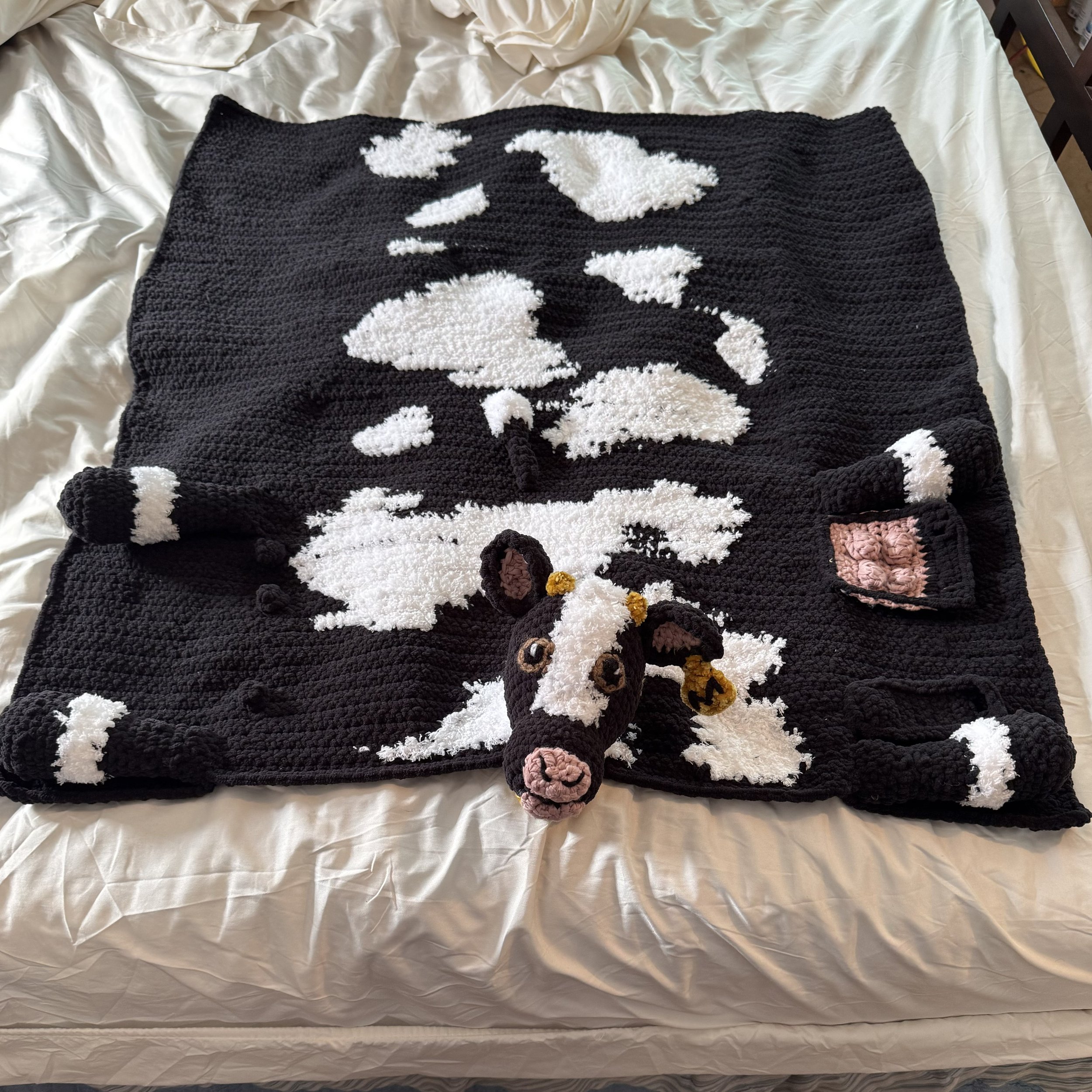 Cuddle-and-play cow blanket, made to size for newborn