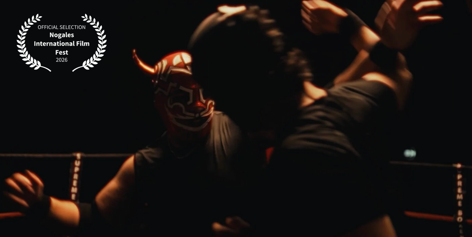 A lucha libre wrestler wearing a red and white mask in a wrestling ring, engaging in a match.