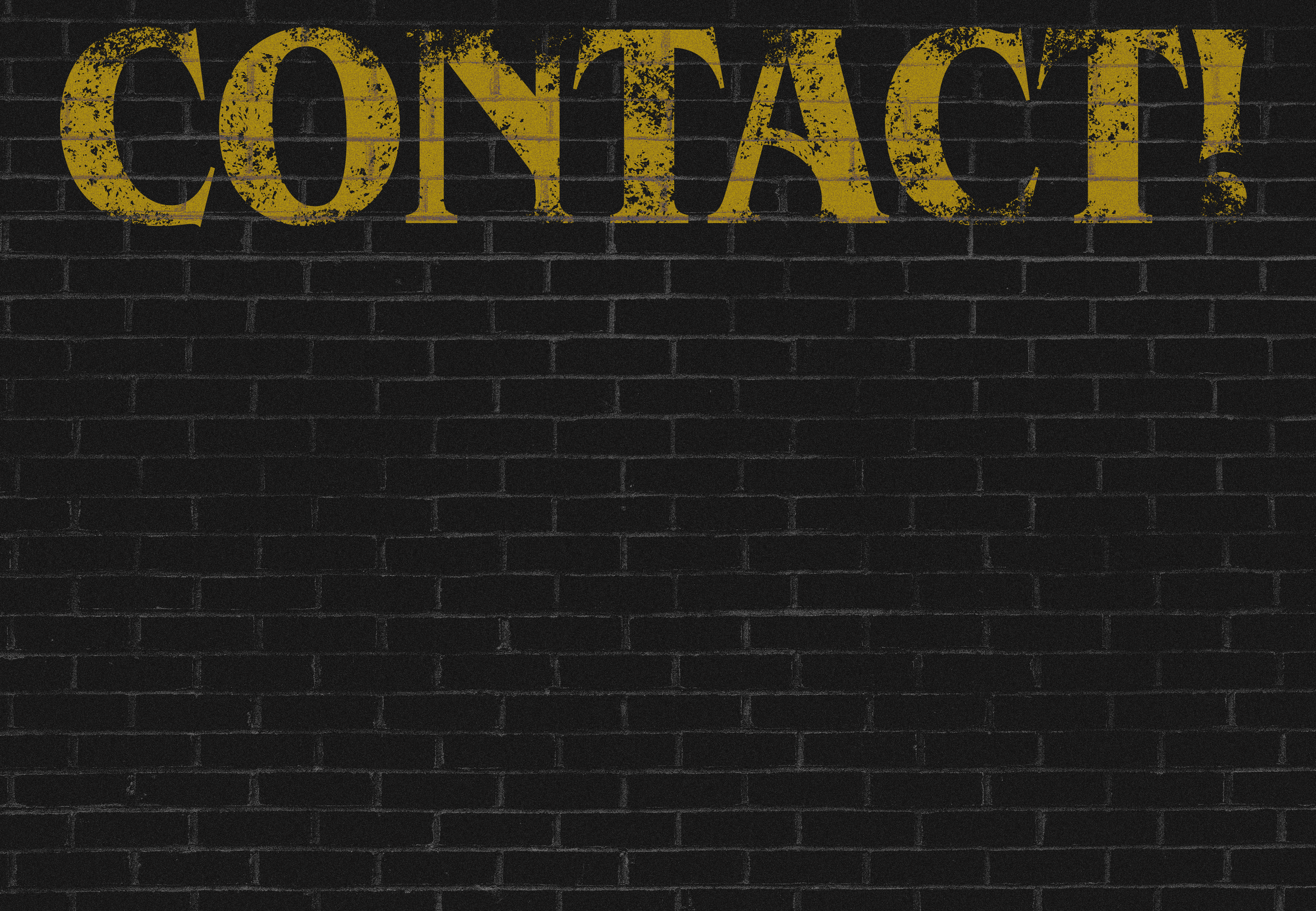 Word 'CONTACT!' painted in large yellow letters on a black brick wall with a distressed appearance.
