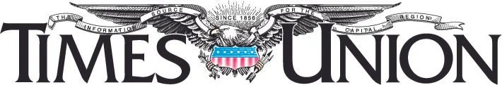 Logo of the Times Union newspaper featuring an eagle with spread wings and a shield.