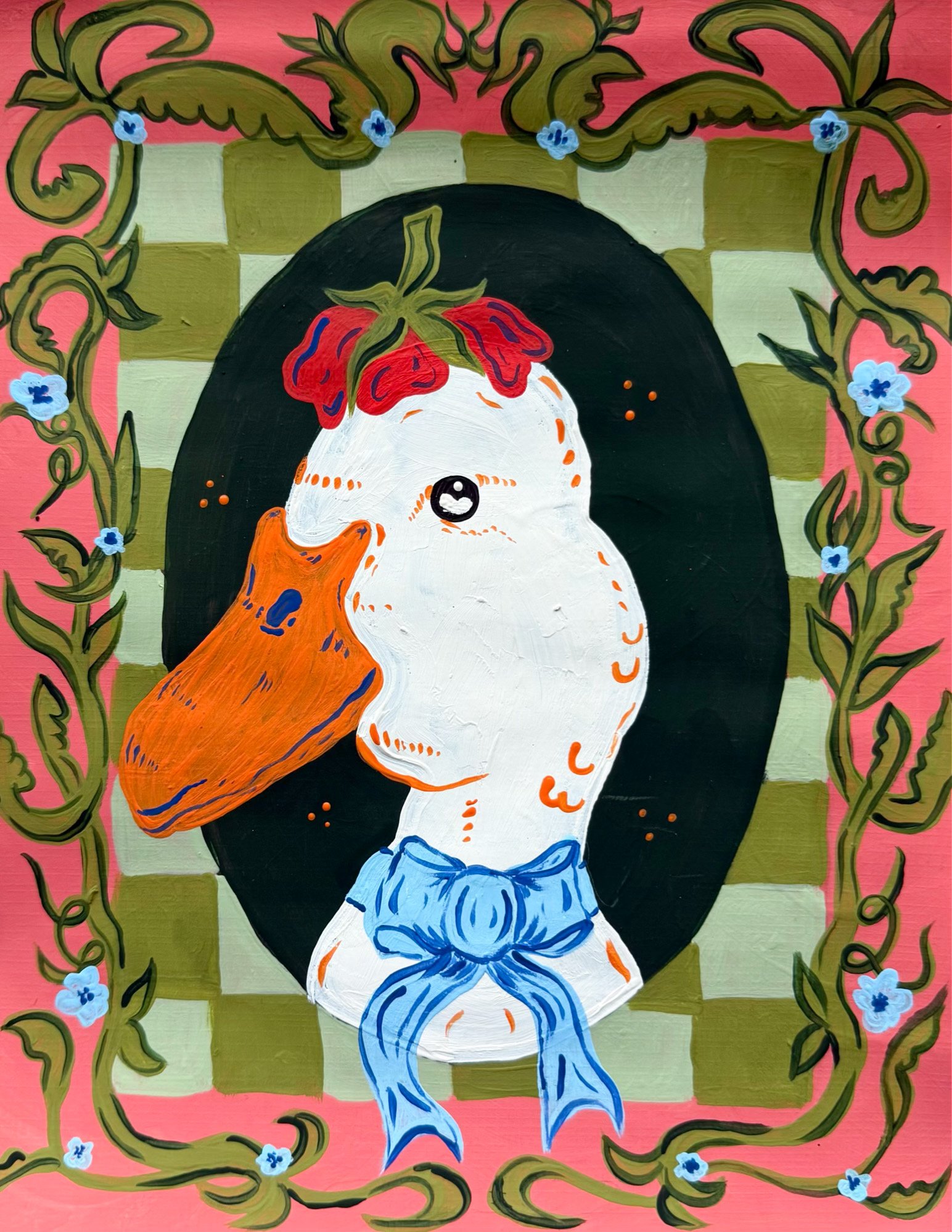 A painting of a goose with a white face, orange beak, and a blue bow tie, surrounded by a decorative green and pink floral frame with small blue flowers. In the background, there is a checkered pattern in shades of olive green and cream.