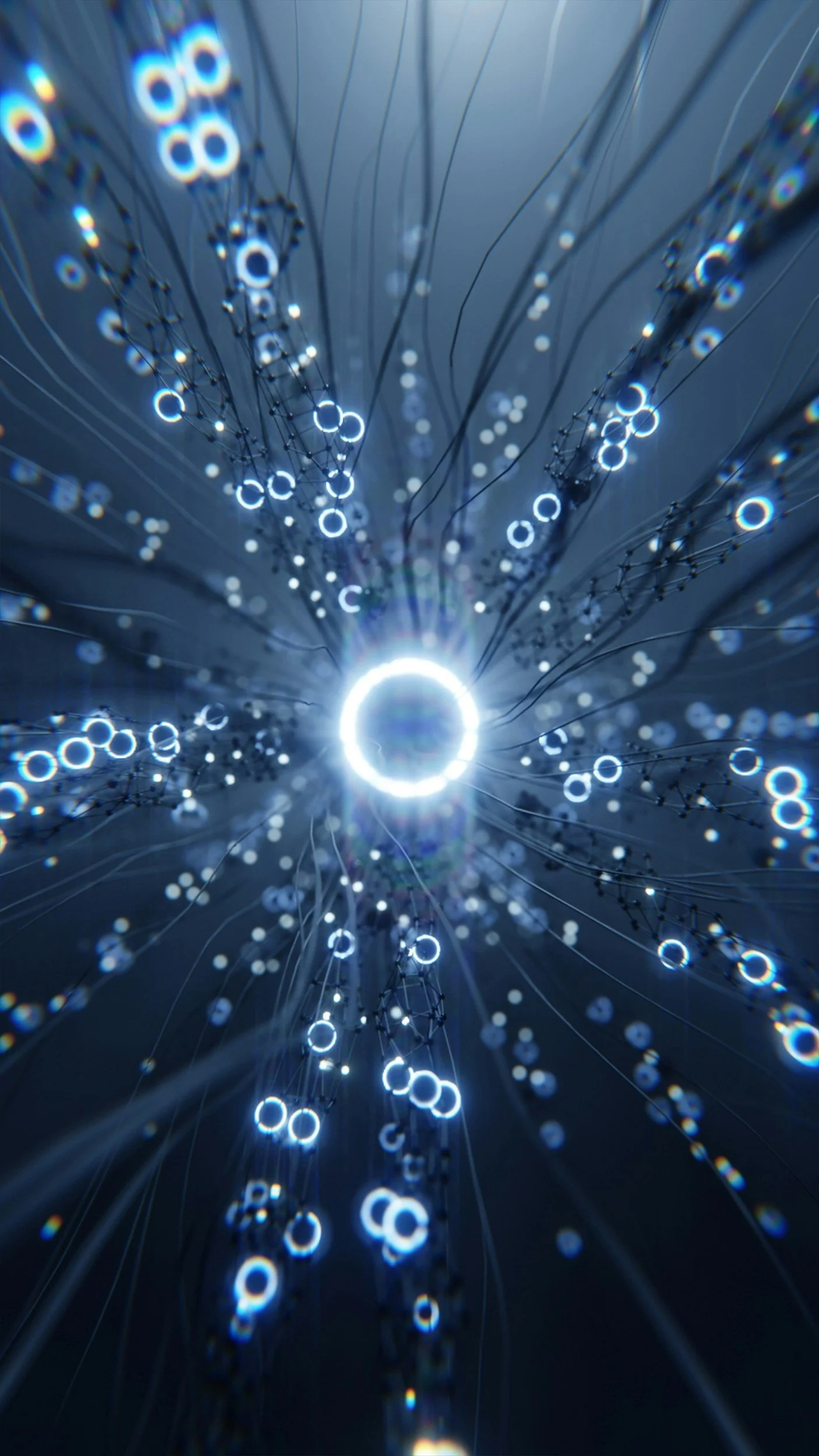 Close-up view of fiber optic cables with glowing rings of light at their tips, creating a network of illuminated strands against a dark background.