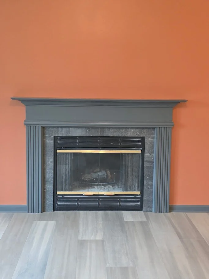 BACES fireplace refinish, flooring, trim and paint.jpg