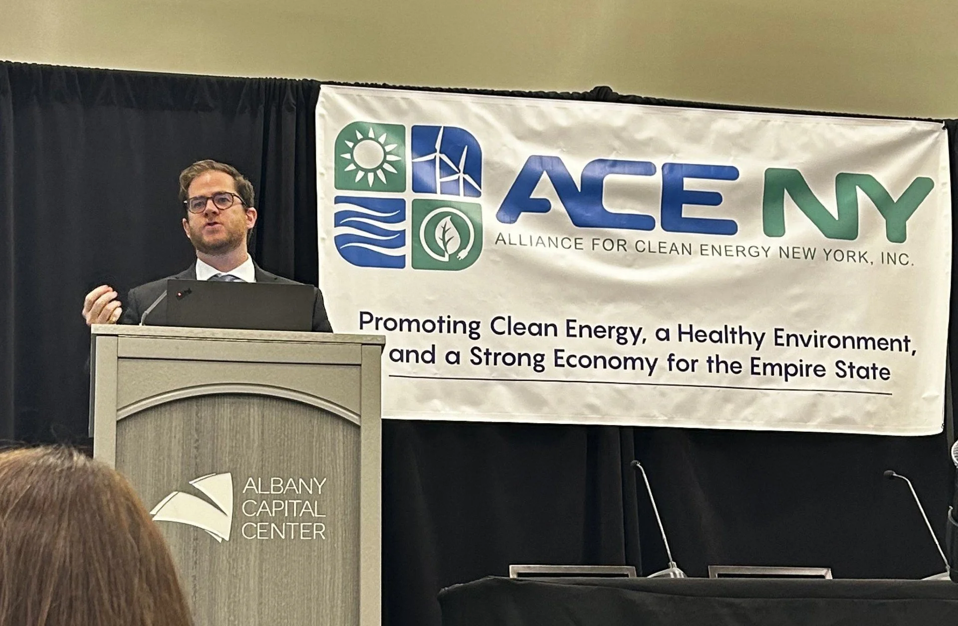Dominic Balog-Way speaking at the Alliance for Clean Energy New York fall conference in 2025.