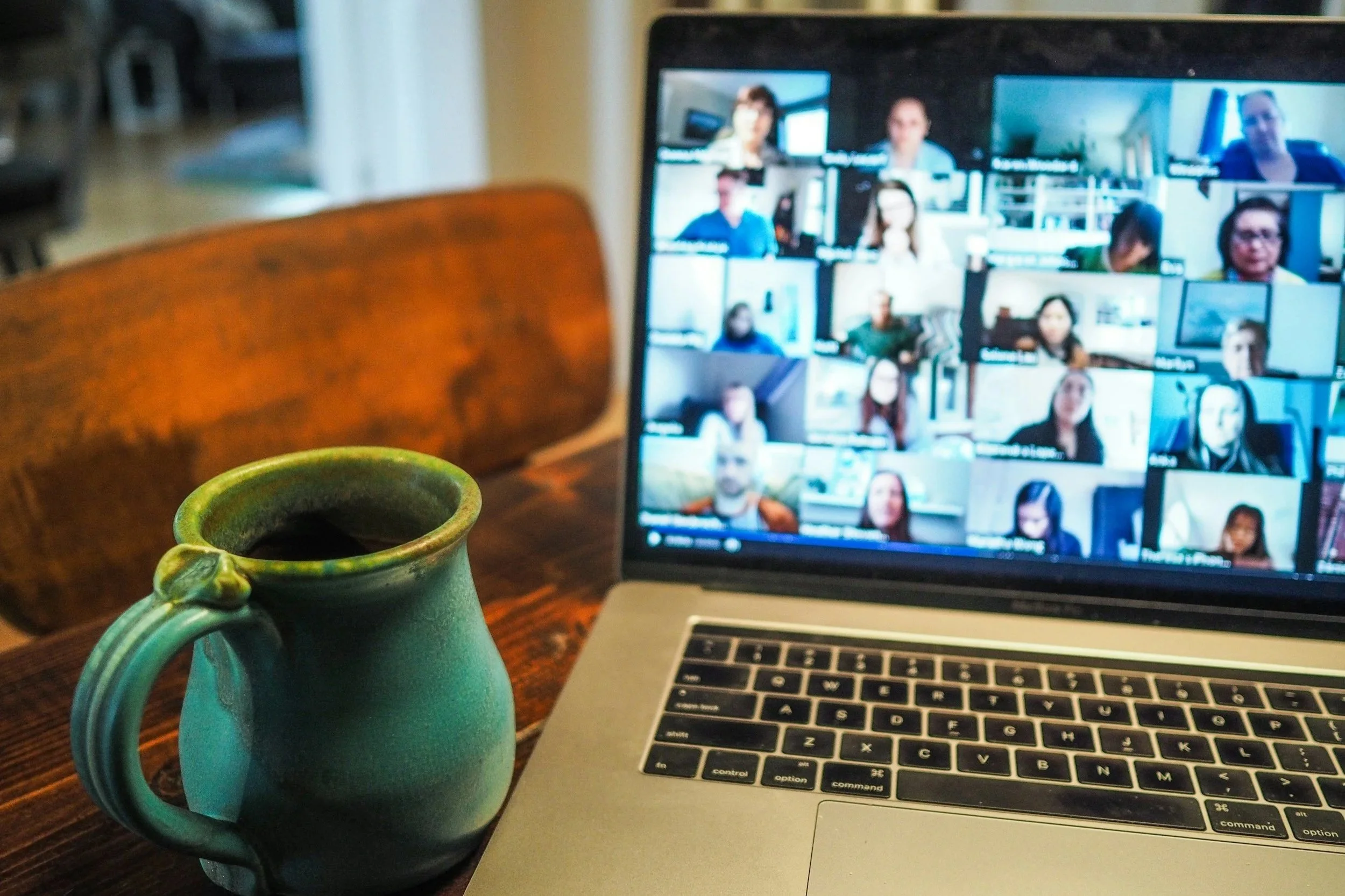 Laptop screen showing many images of people online