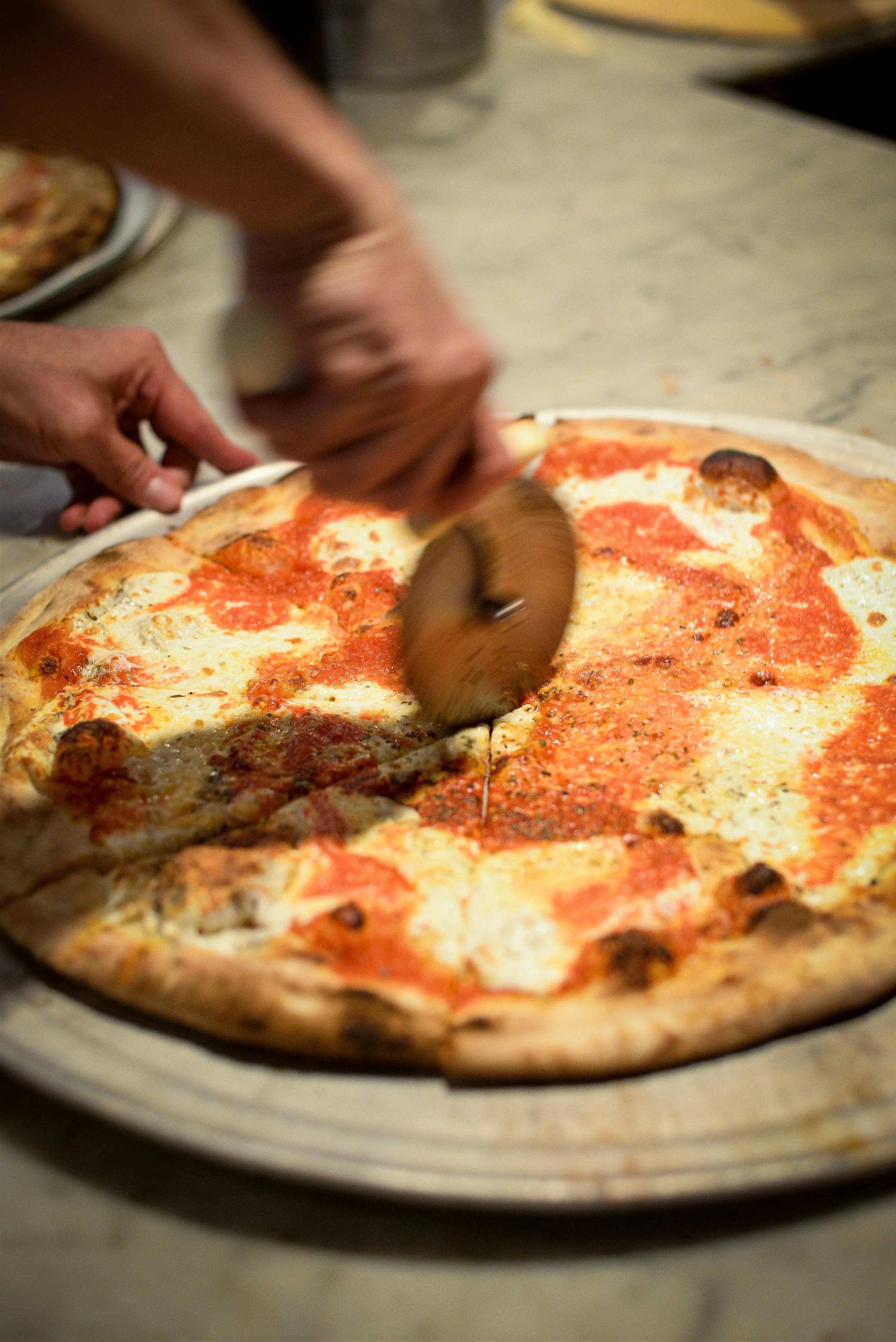 Cutting a pizza