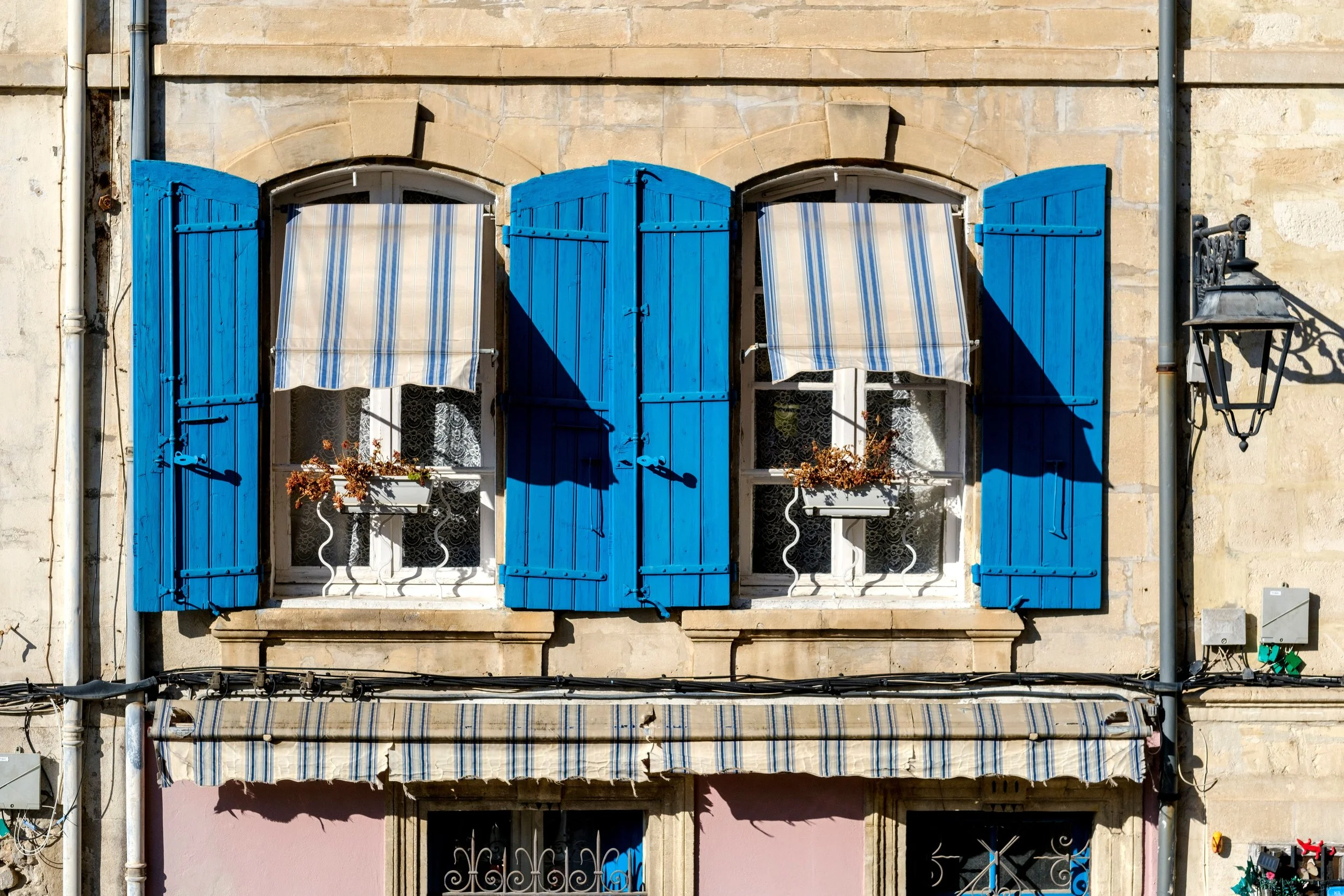 blue shutters in a french village