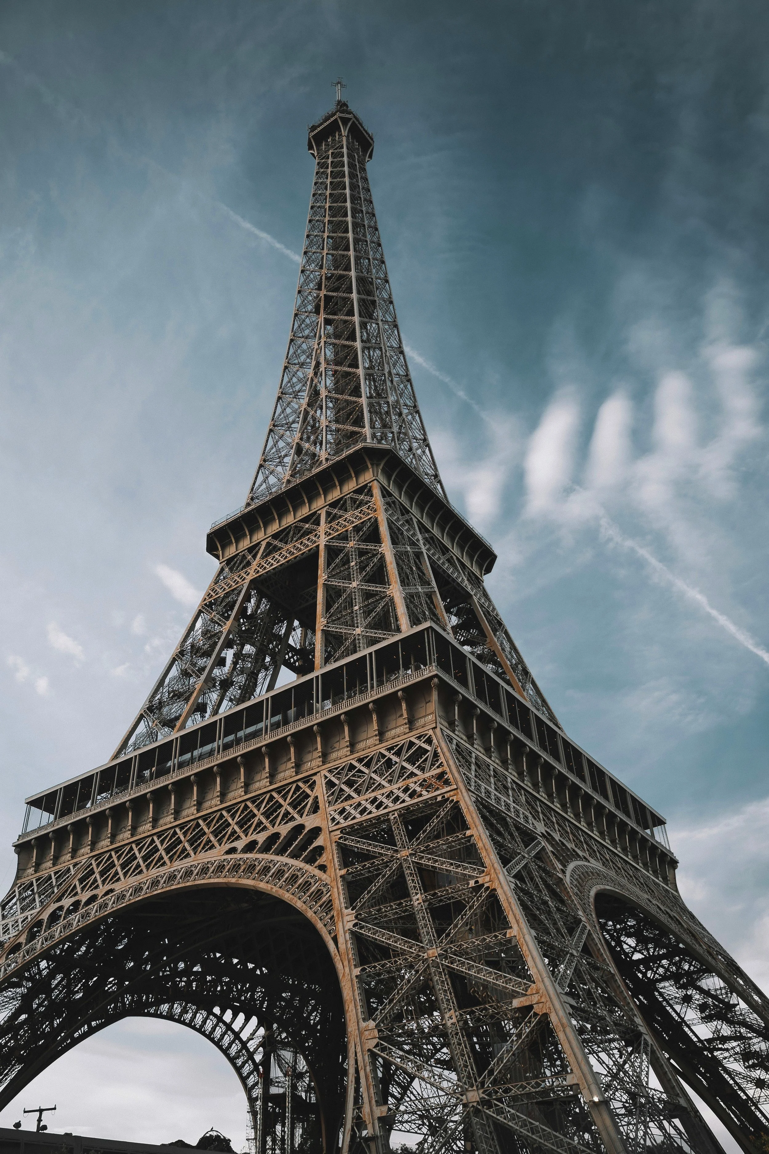 Low-angle view of the Eiffel Tower's iron lattice architecture