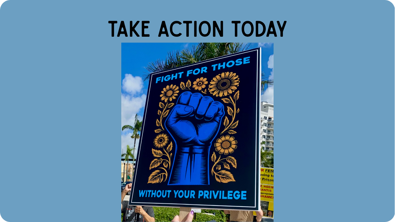Protest sign with a blue fist surrounded by yellow sunflower art text fight for those without your privilege