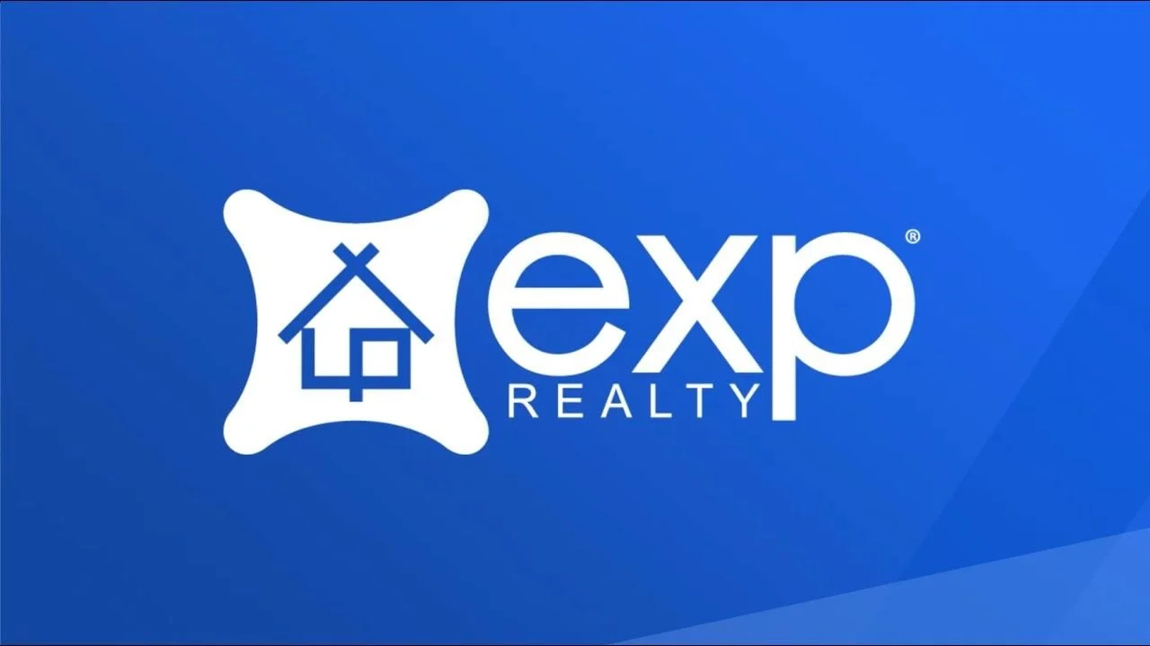 Exp Realty logo with a stylized house inside a white square on a blue background.