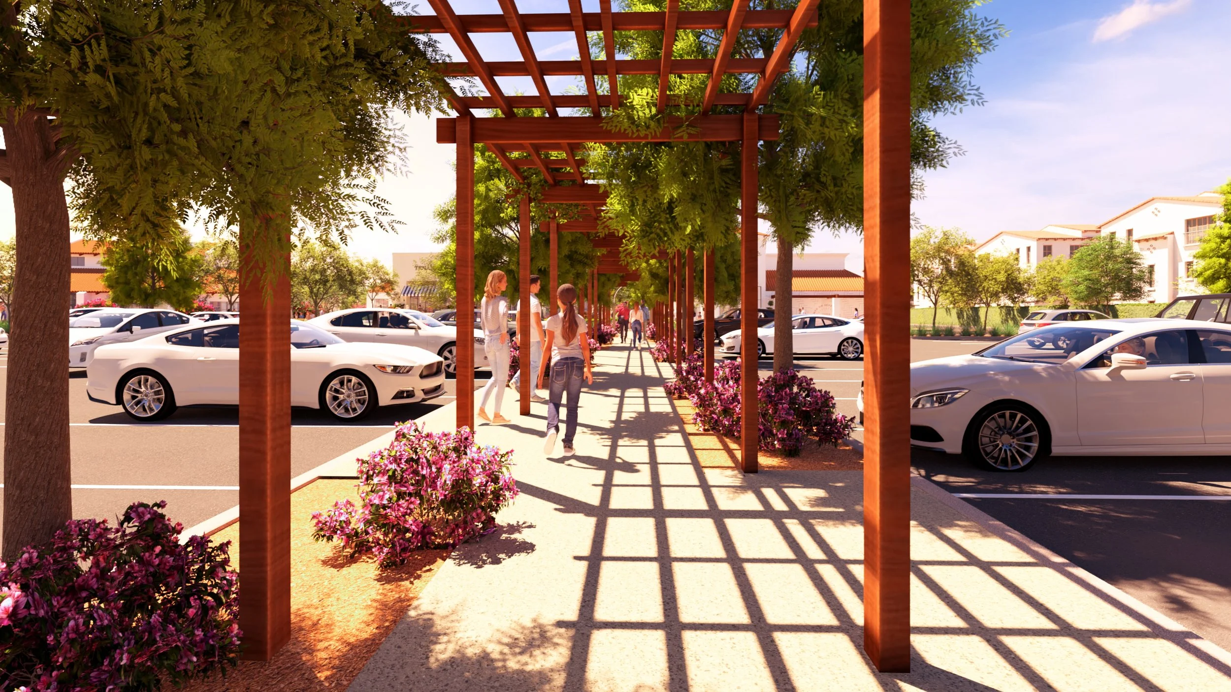People walking under a wooden pergola with trees and flowers in a parking lot.