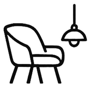 A line drawing of a cushioned office or lounge chair with armrests, positioned next to a desk or table with a hanging lamp above it.