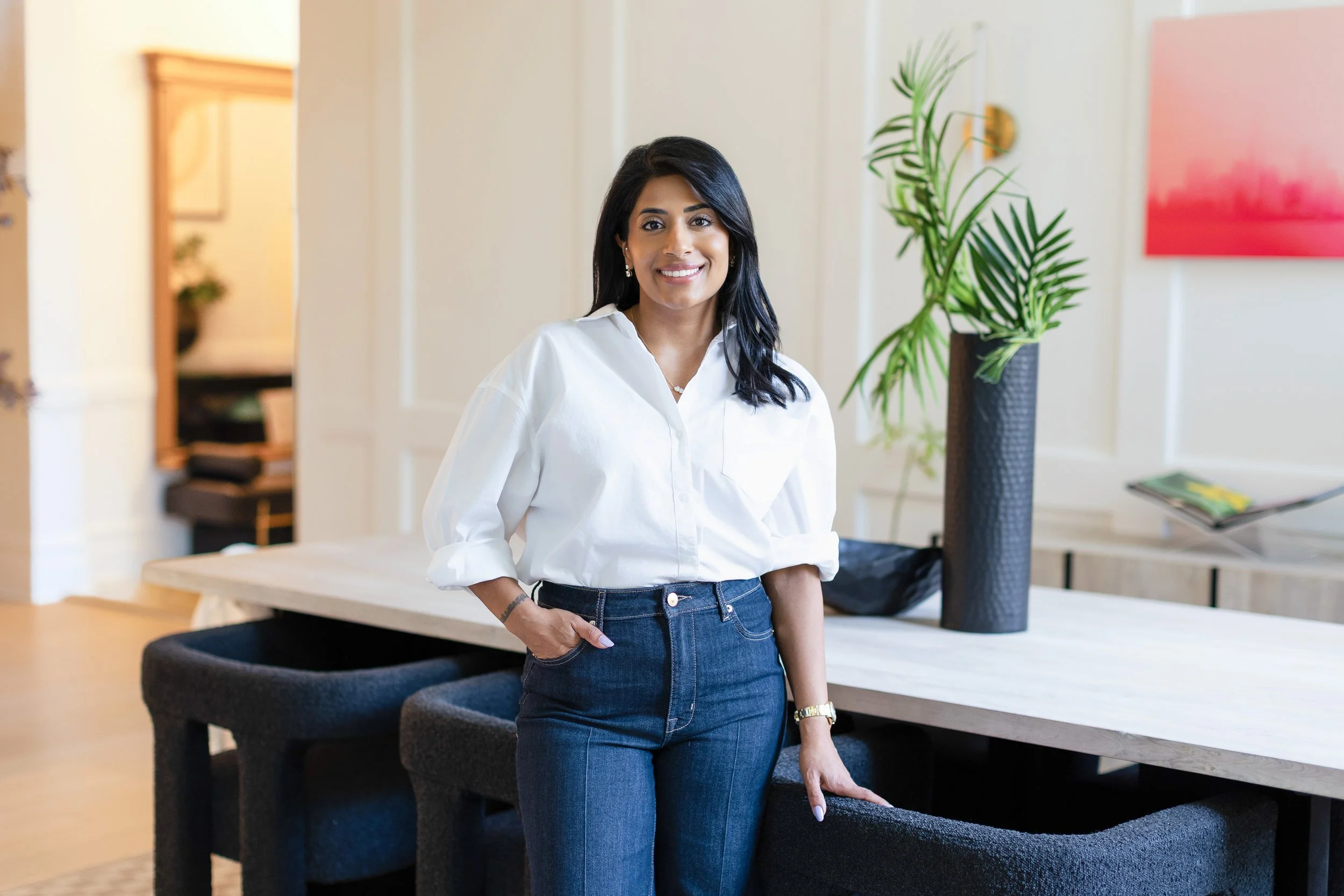 Shradha Lukka, founder of Lukka Collective, standing in a modern interior space, offering expert kitchen renovation, bathroom design, and residential interior design services across New Jersey, Hoboken, and New York City.