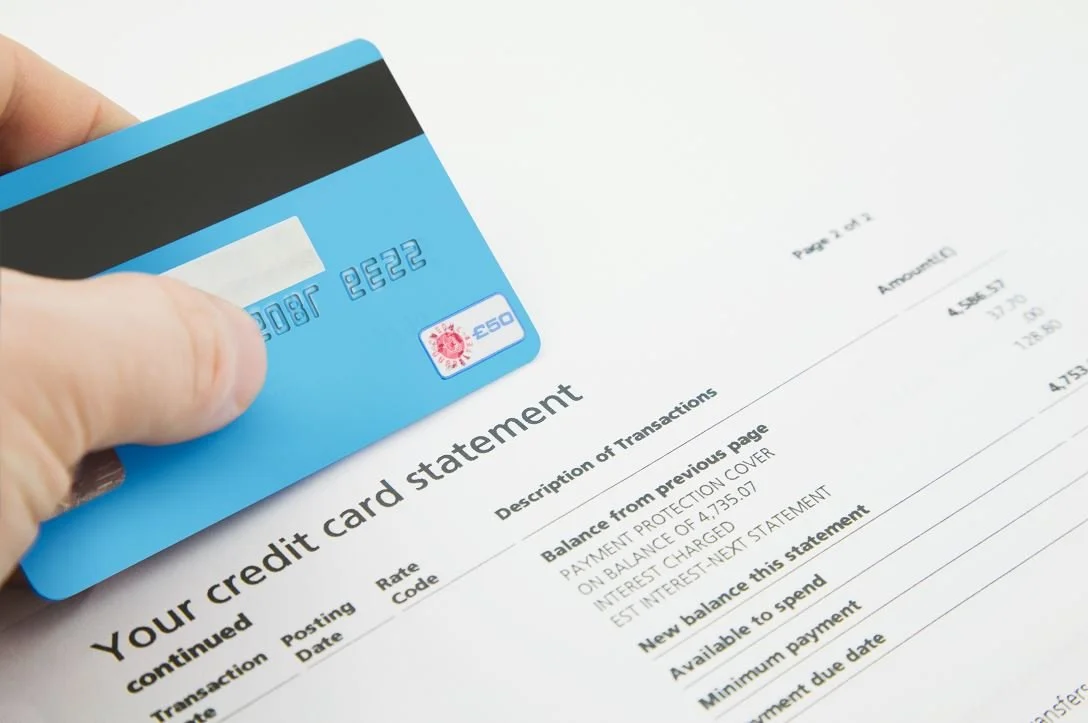 A consultant conducting a credit card processing statement analysis.