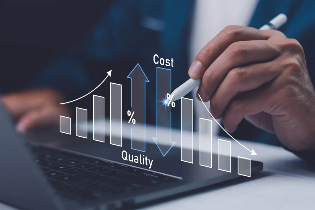 Hand holding a stylus illustrating the cost impact of a rate optimization analysis.