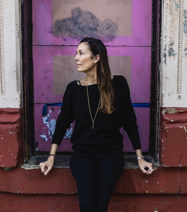 Tamara White in front of Bader + Simon prior to construction renovations.