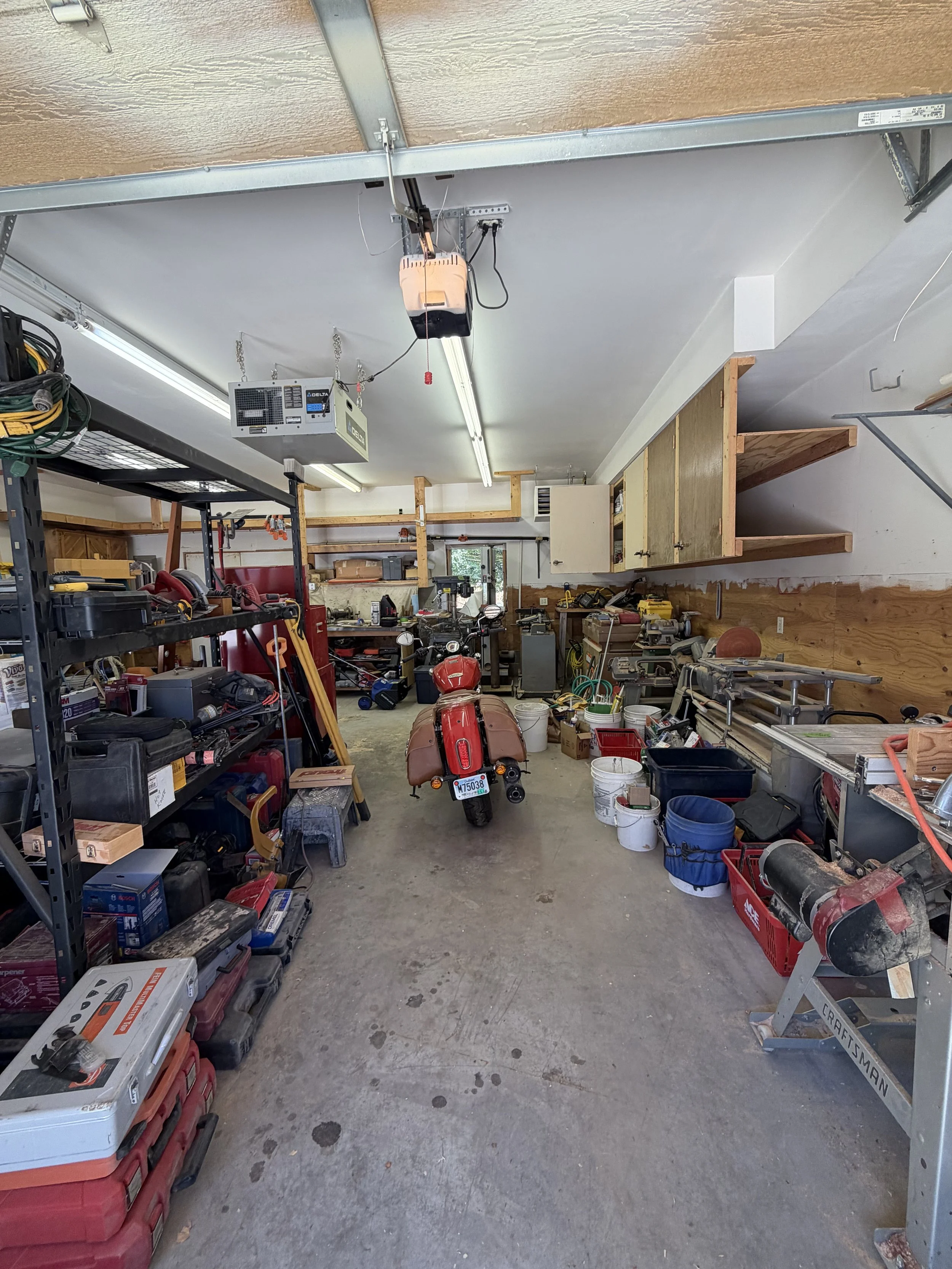 BEFORE…It might look (sorta) neat but really everything is just jammed against the wall and not accessible.