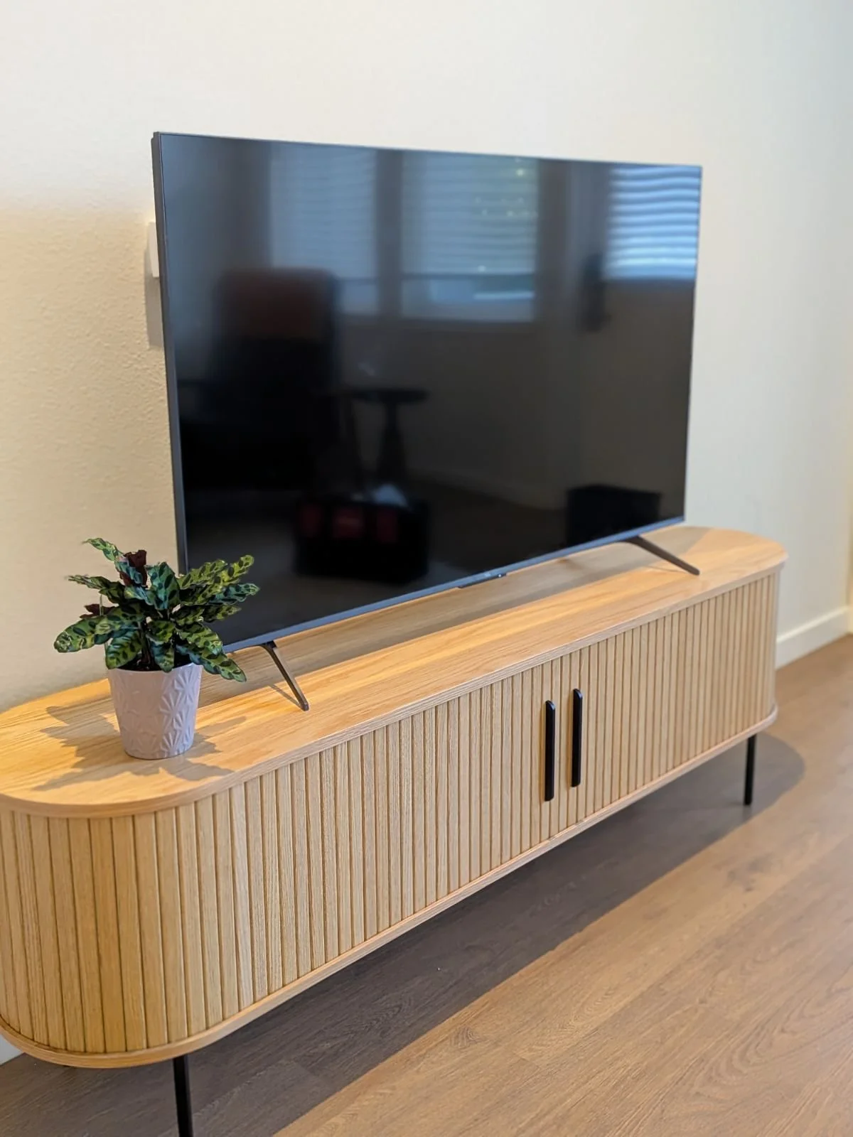 AFTER…Another gorgeous mid mod piece to anchor the living room (and add storage).