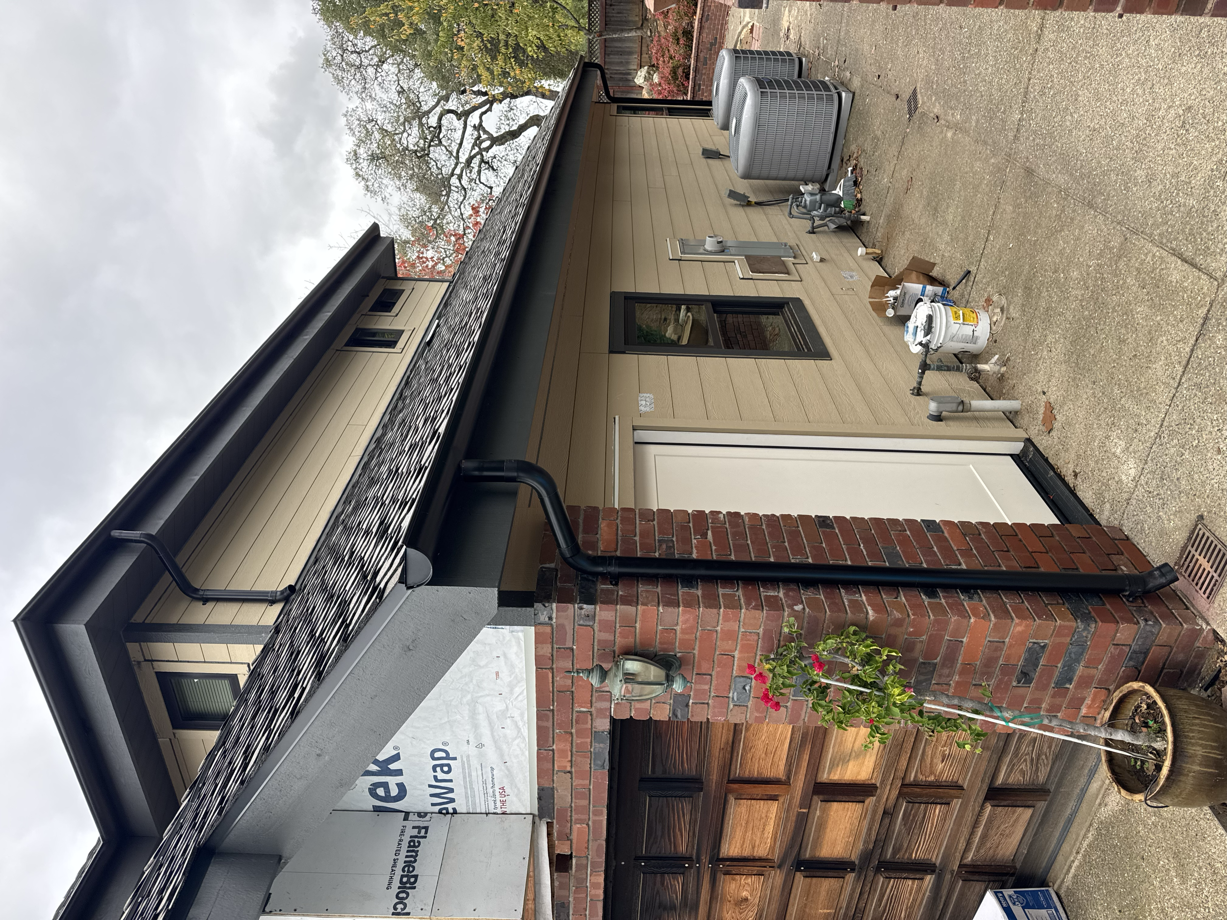 Gutter Installation Black 6" Half Round Gutter at This El Dorado Home 