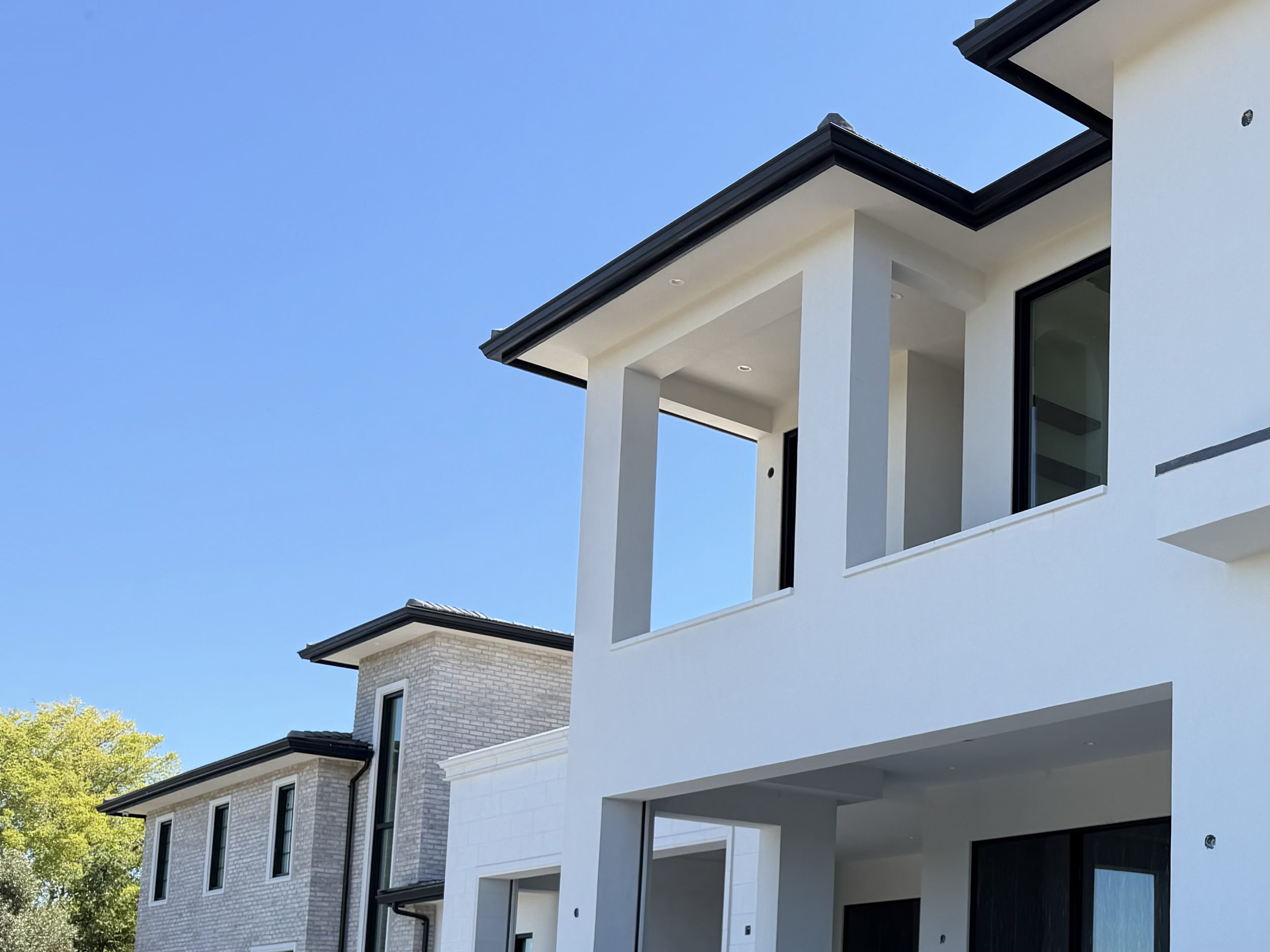 Gutter Installation of 6" black k-style gutter at this beautiful Granite Bay home