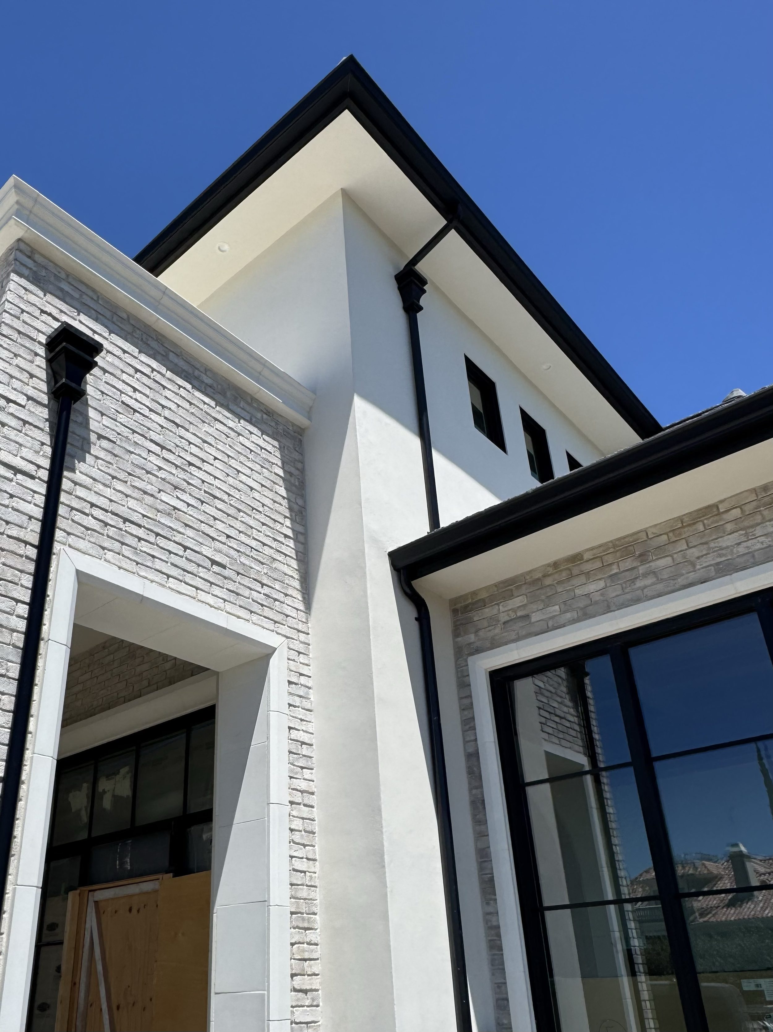 Gutter Installation of 6" black k-style gutter at this beautiful Granite Bay home