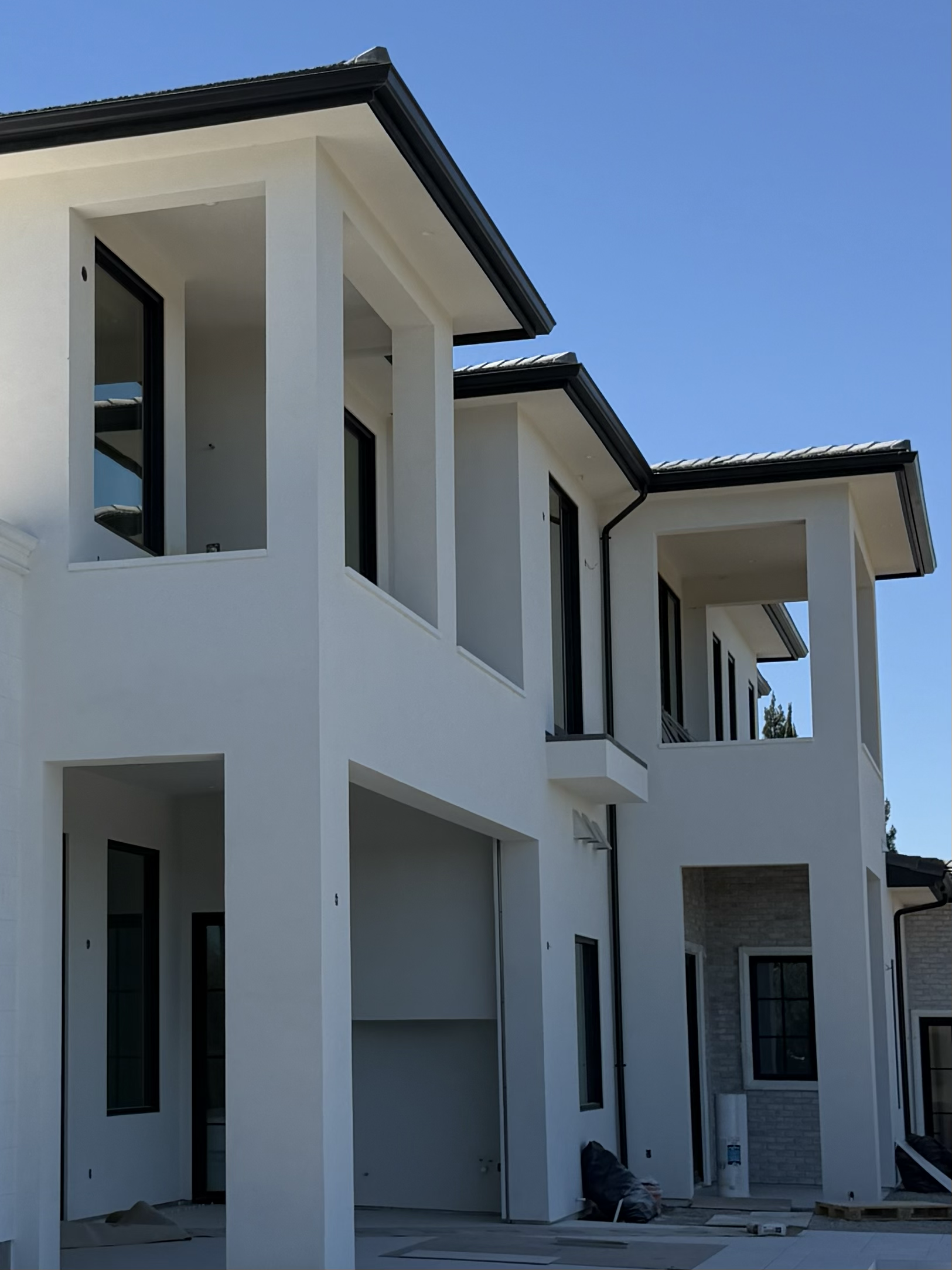 Gutter Installation of 6" black k-style gutter at this beautiful Granite Bay home