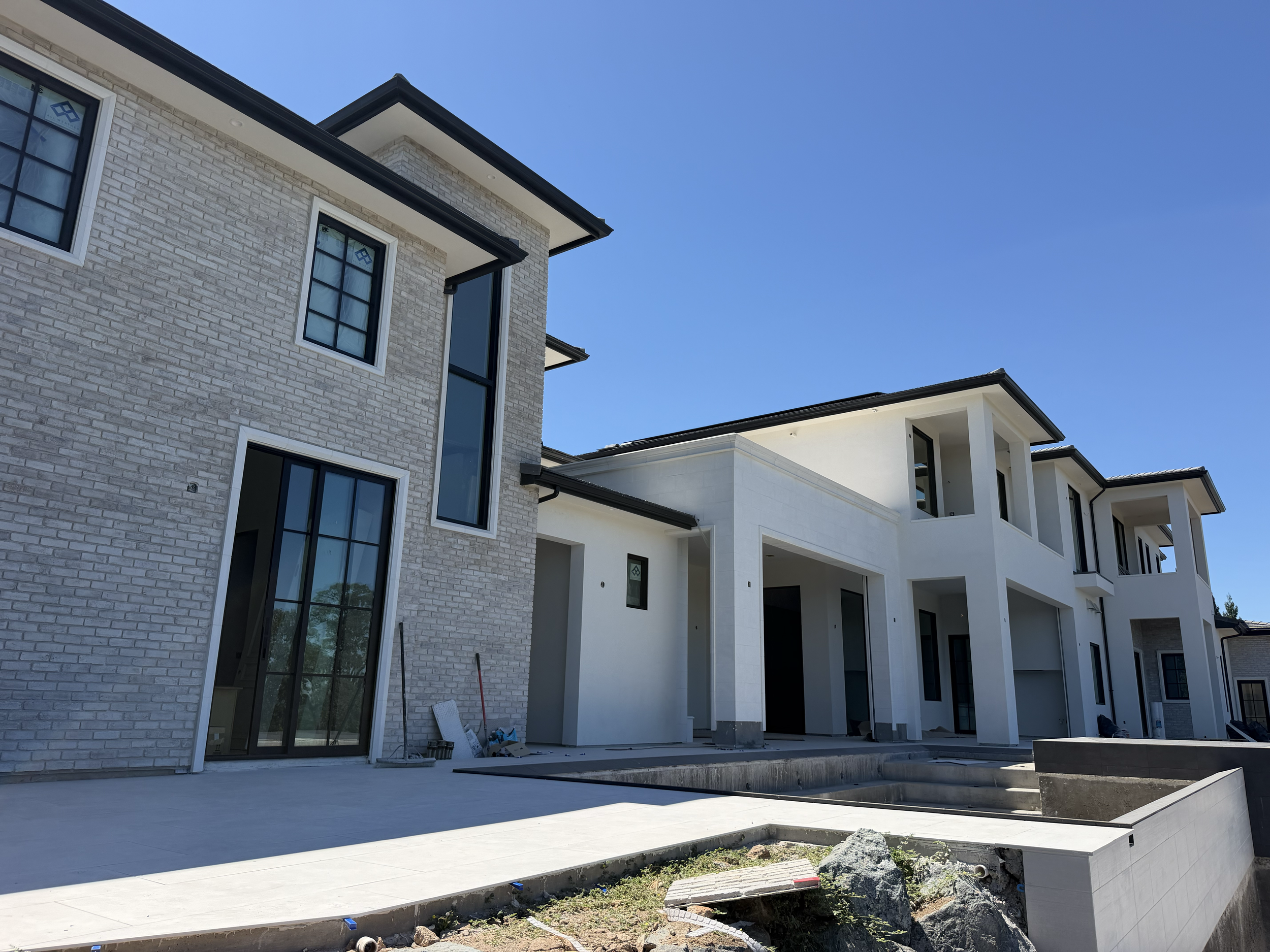 Gutter Installation of 6" Black K-style Gutter at This Beautiful Granite Bay Home