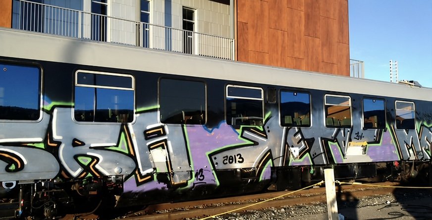 Retrait de graffiti sur le train de Charlevoix - Avant