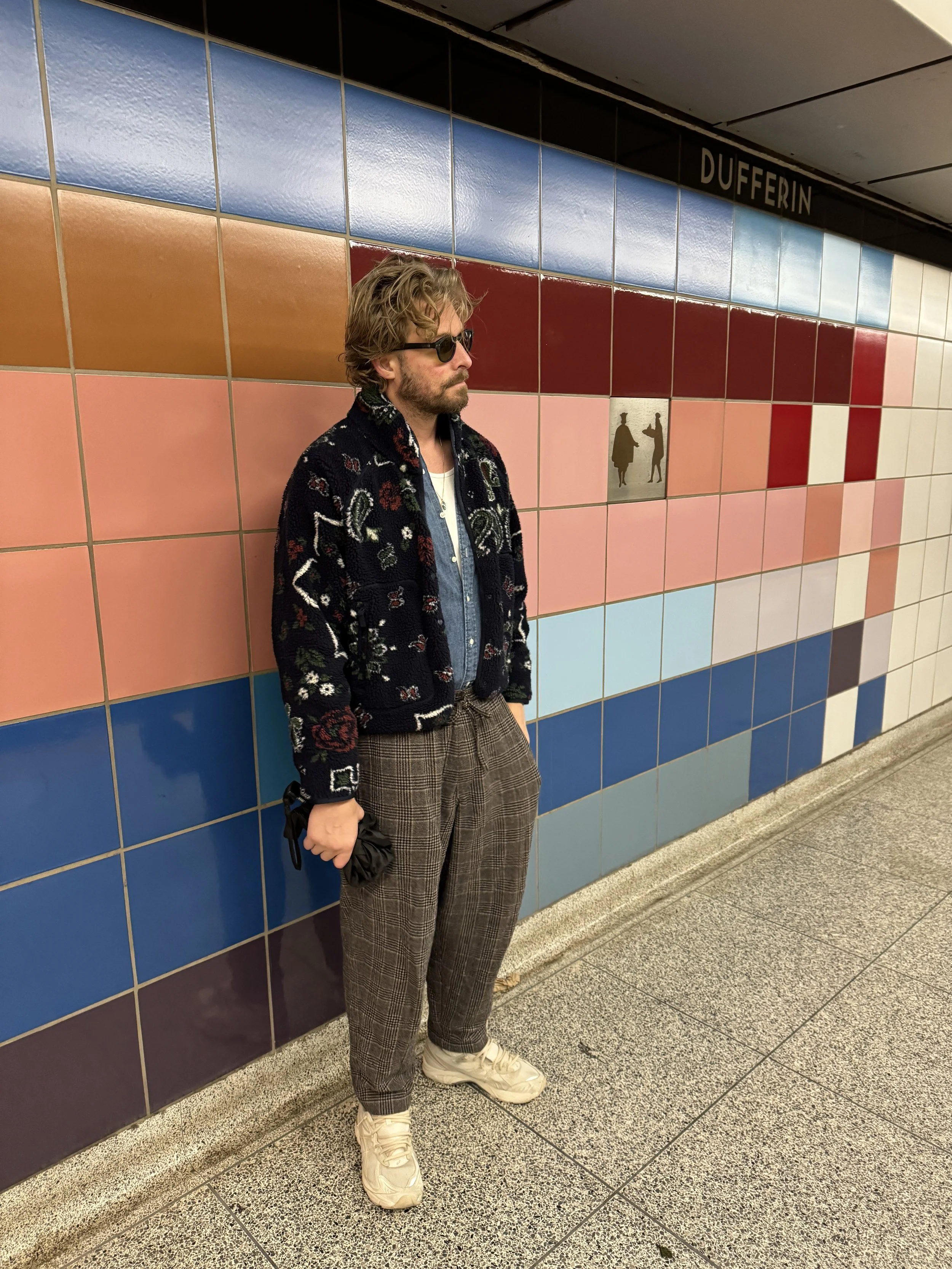 A man waits for the train.