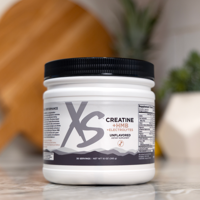 Container of Xtreme Sports Creatine with HMB and electrolytes on a countertop
