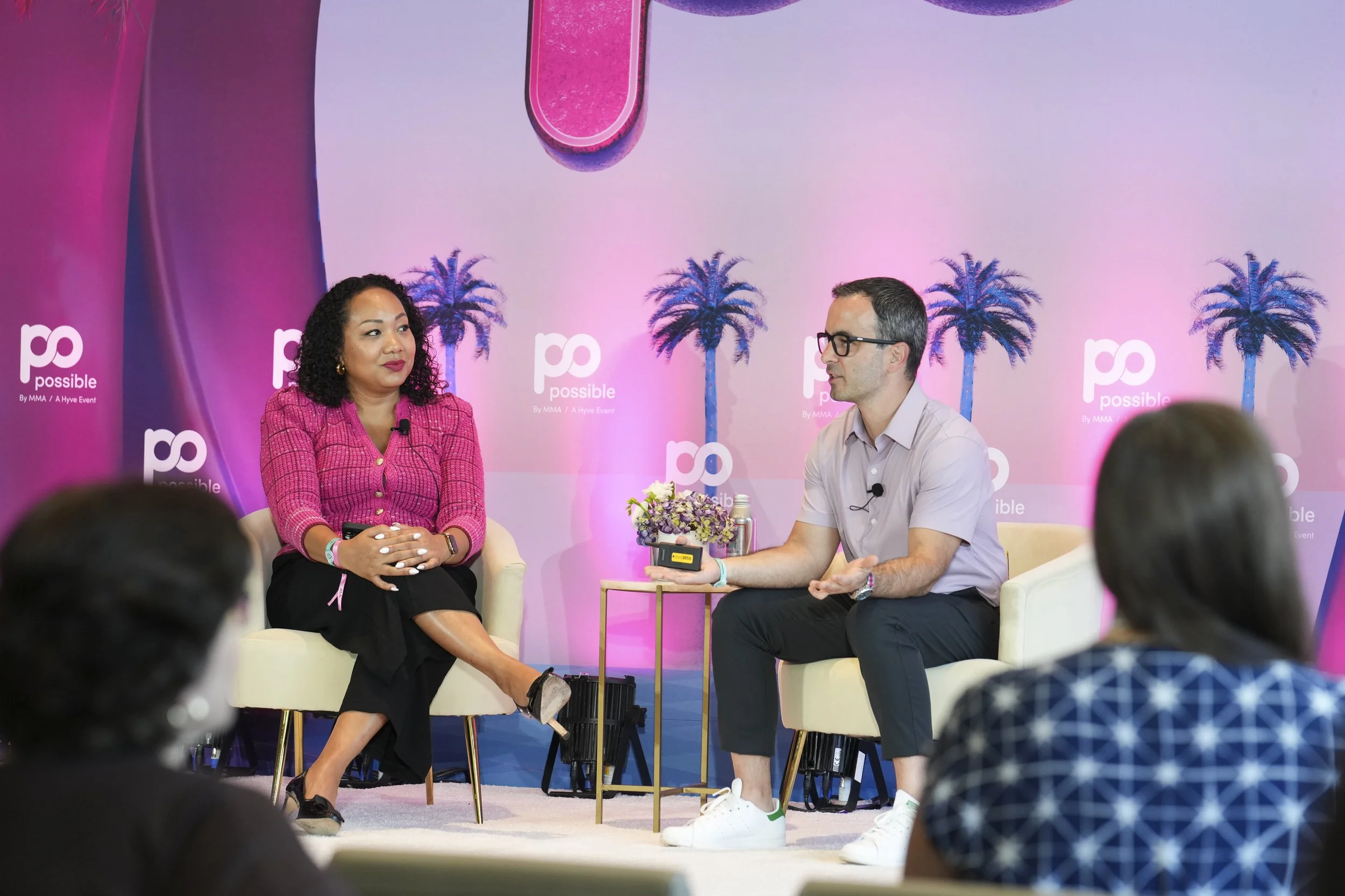 Demar presenting on stage at Possible 2026 in Miami.