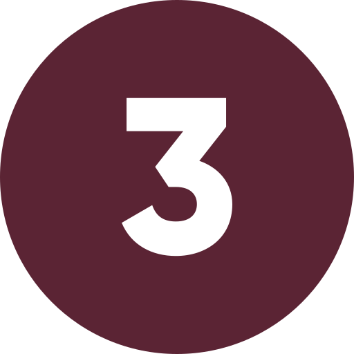 A maroon circle with the black number 3 in the center.