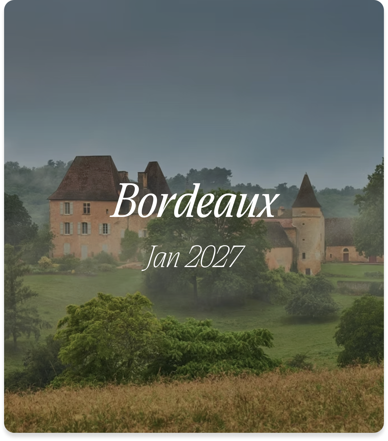 Scenic view of a historic castle in Bordeaux, France, surrounded by lush green trees and grass, with a cloudy sky overhead, and text overlay indicating January 2023.