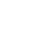 Two large white quotation marks against a dark background.