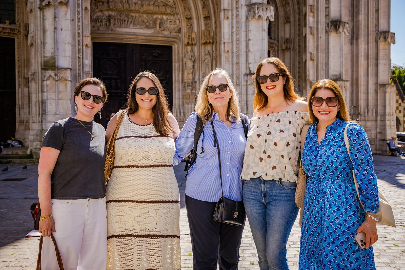 Maison d'Amies retreat guests gathered in front of Rouen Cathedral in Normandy, France