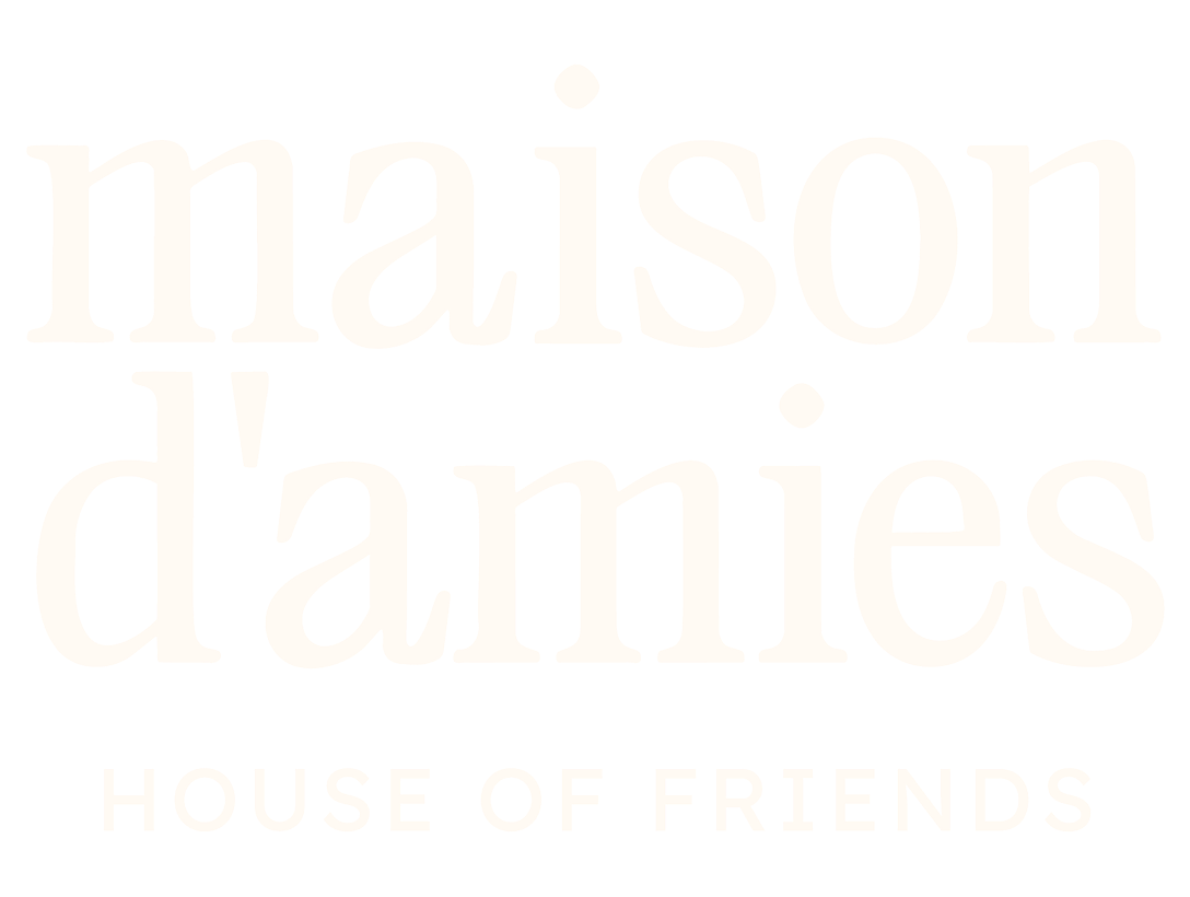 Black and white logo for Maison d'Amies House of Friends