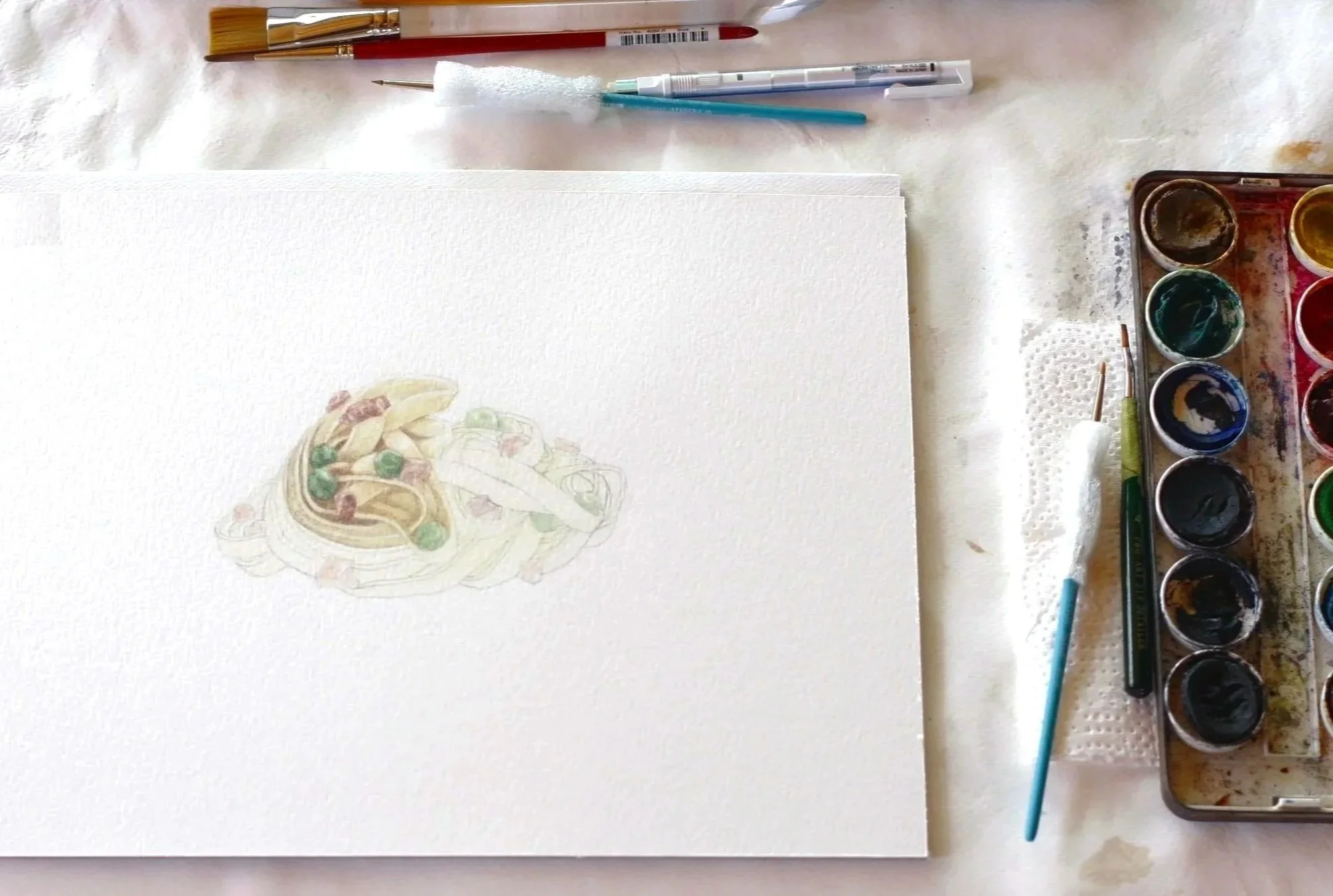 Work in progress photo of creating "The Starving Artist Cookbook" by Sara Zin.