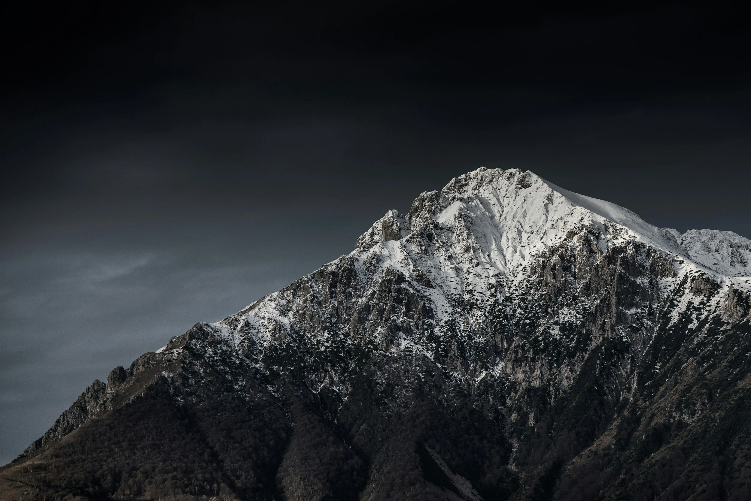 Snow-capped mountain summit