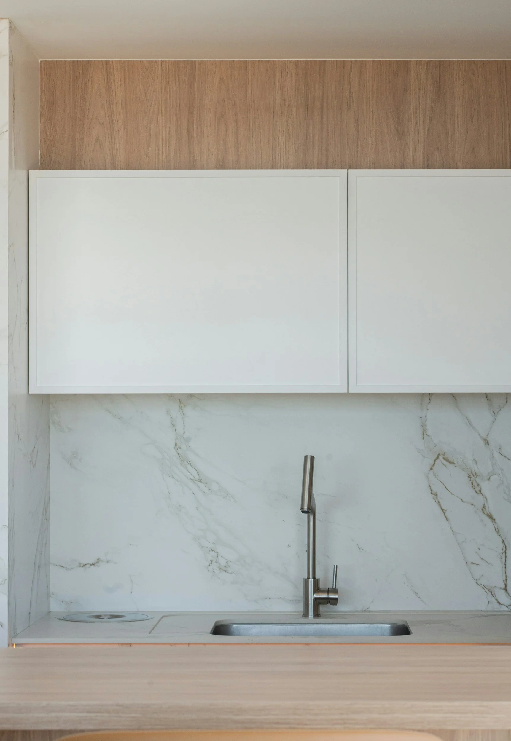 Modern kitchen sink with custom marble countertop