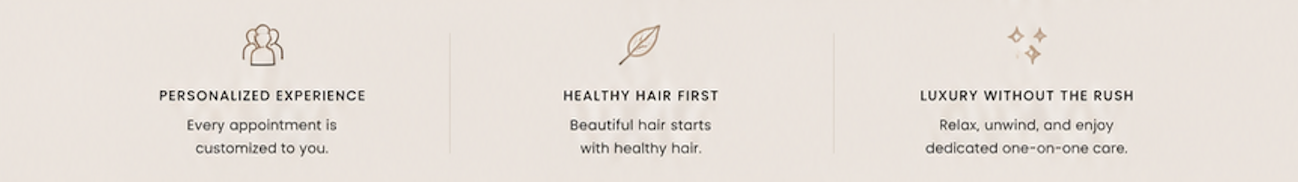 Three icons with text beneath each. The first icon is a group of people with the text "Personalized Experience" and "Every appointment is customized to you." The second icon is a leaf with the text "Healthy Hair First" and "Beautiful hair starts with healthy hair." The third icon is a cluster of stars with the text "Luxury Without The Rush" and "Relax, unwind, and enjoy dedicated one-on-one care."