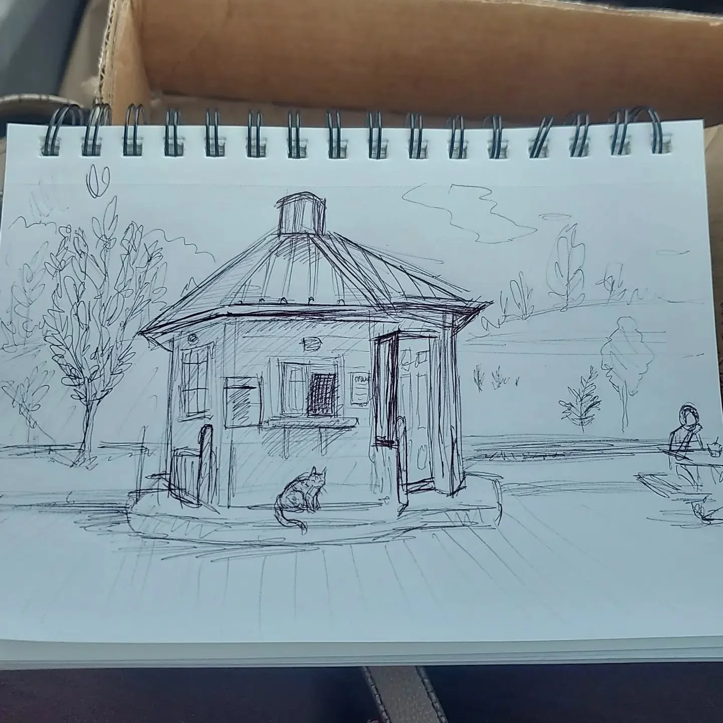Drawing one of my favorite food spots in town while waiting for food. The cat is such a cutie, she's always waiting around to get some sneaky bites of food 😁