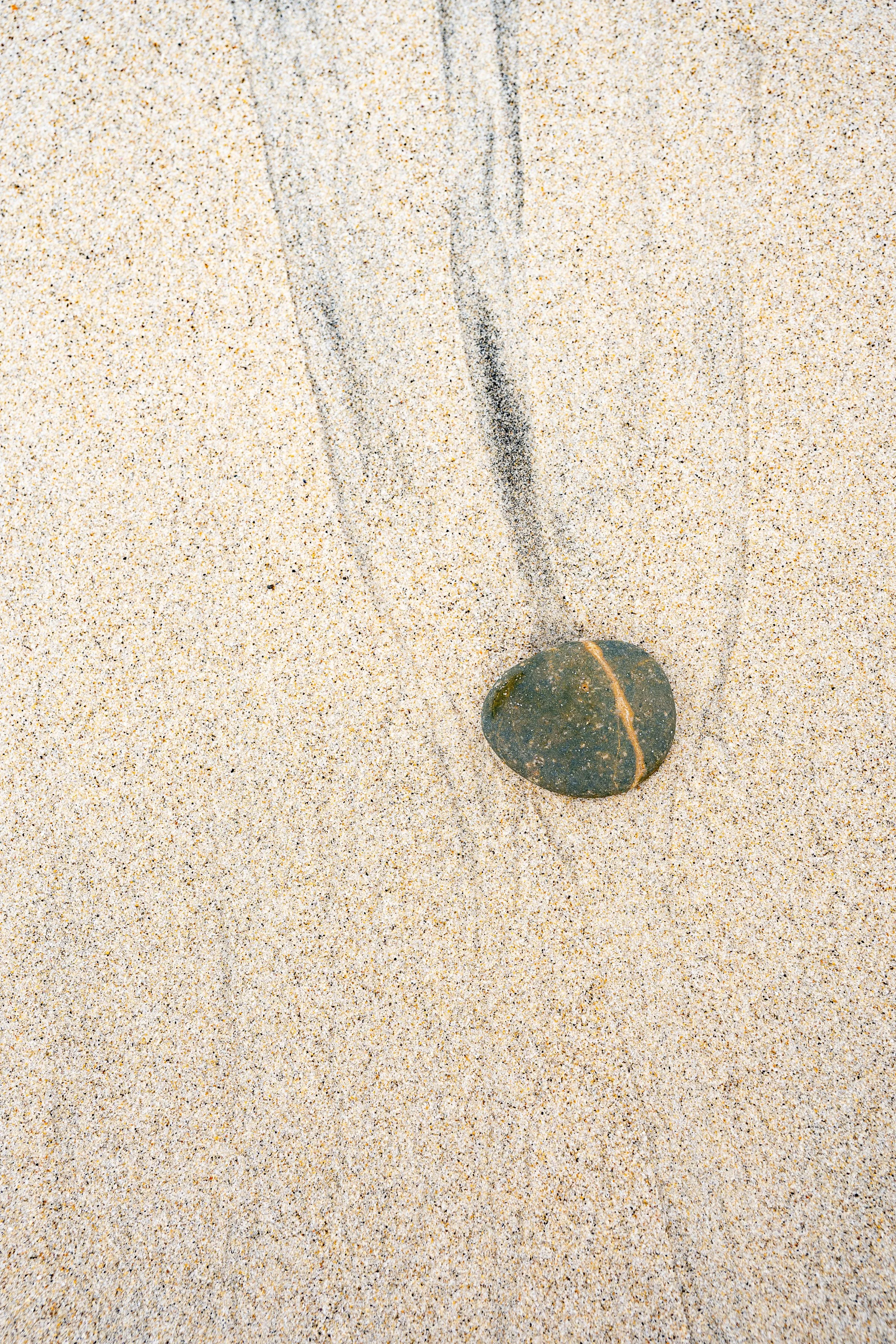 photo of rocks in beach  sand